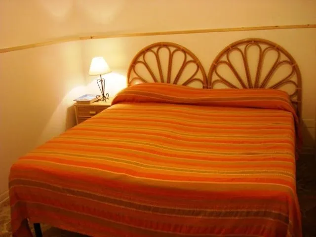 Bed in Case Vacanze Arcobaleno