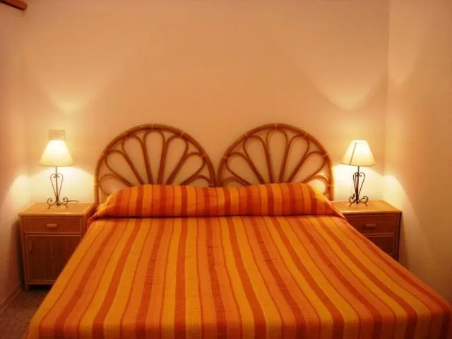 Bed in Case Vacanze Arcobaleno