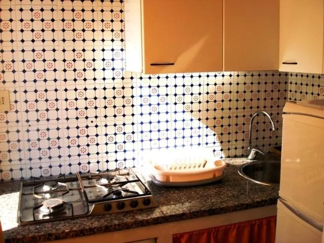 Kitchen or kitchenette in Case Vacanze Arcobaleno