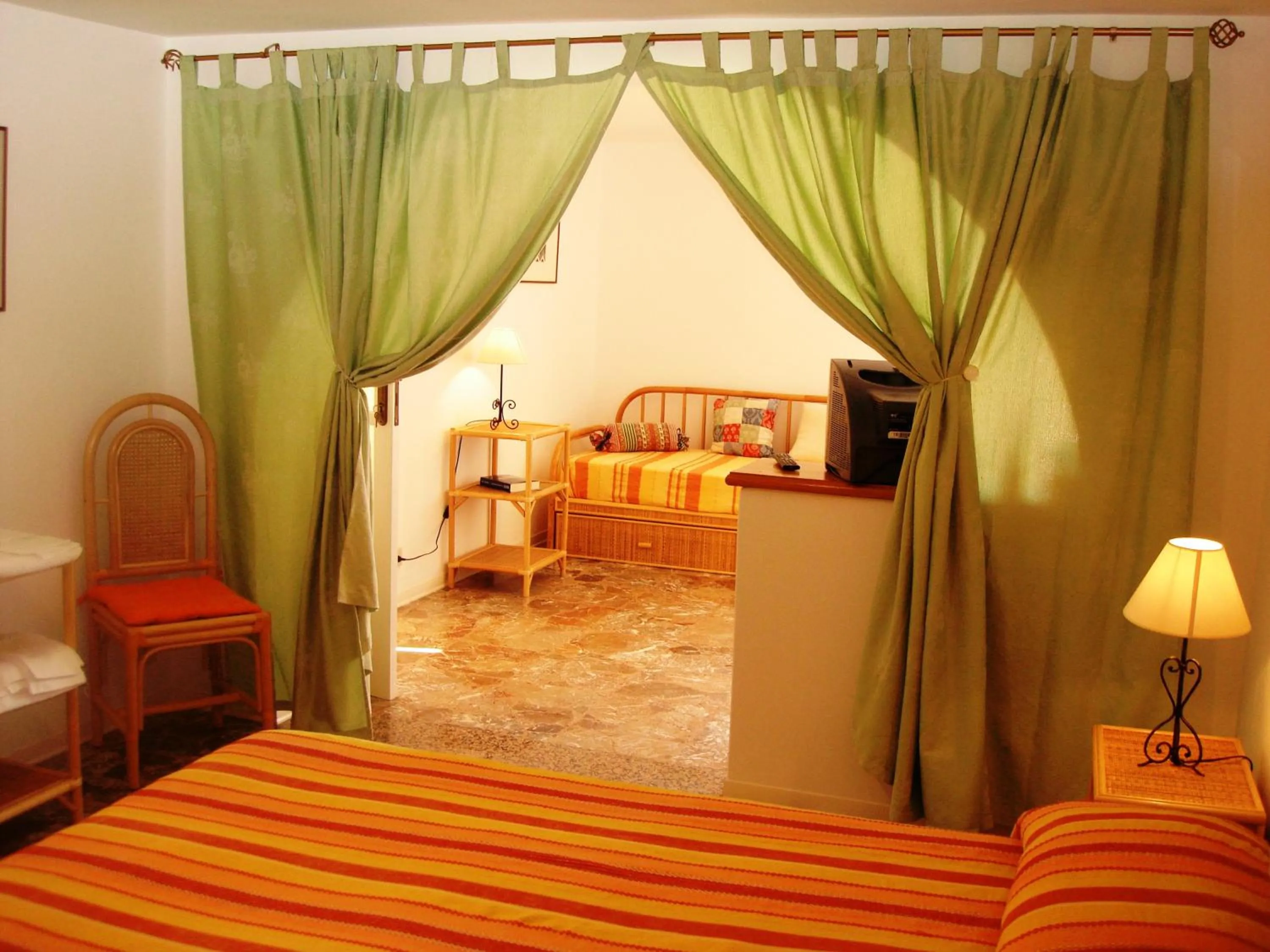 Decorative detail, Bed in Case Vacanze Arcobaleno