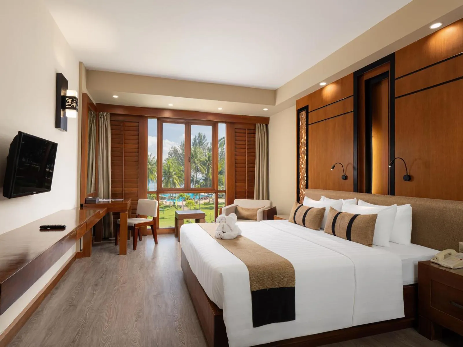 Bed in Nirwana Resort Hotel