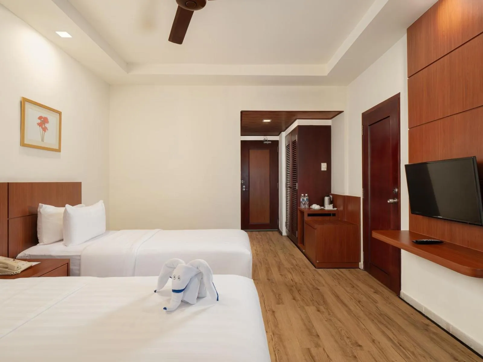 Bed in Nirwana Resort Hotel