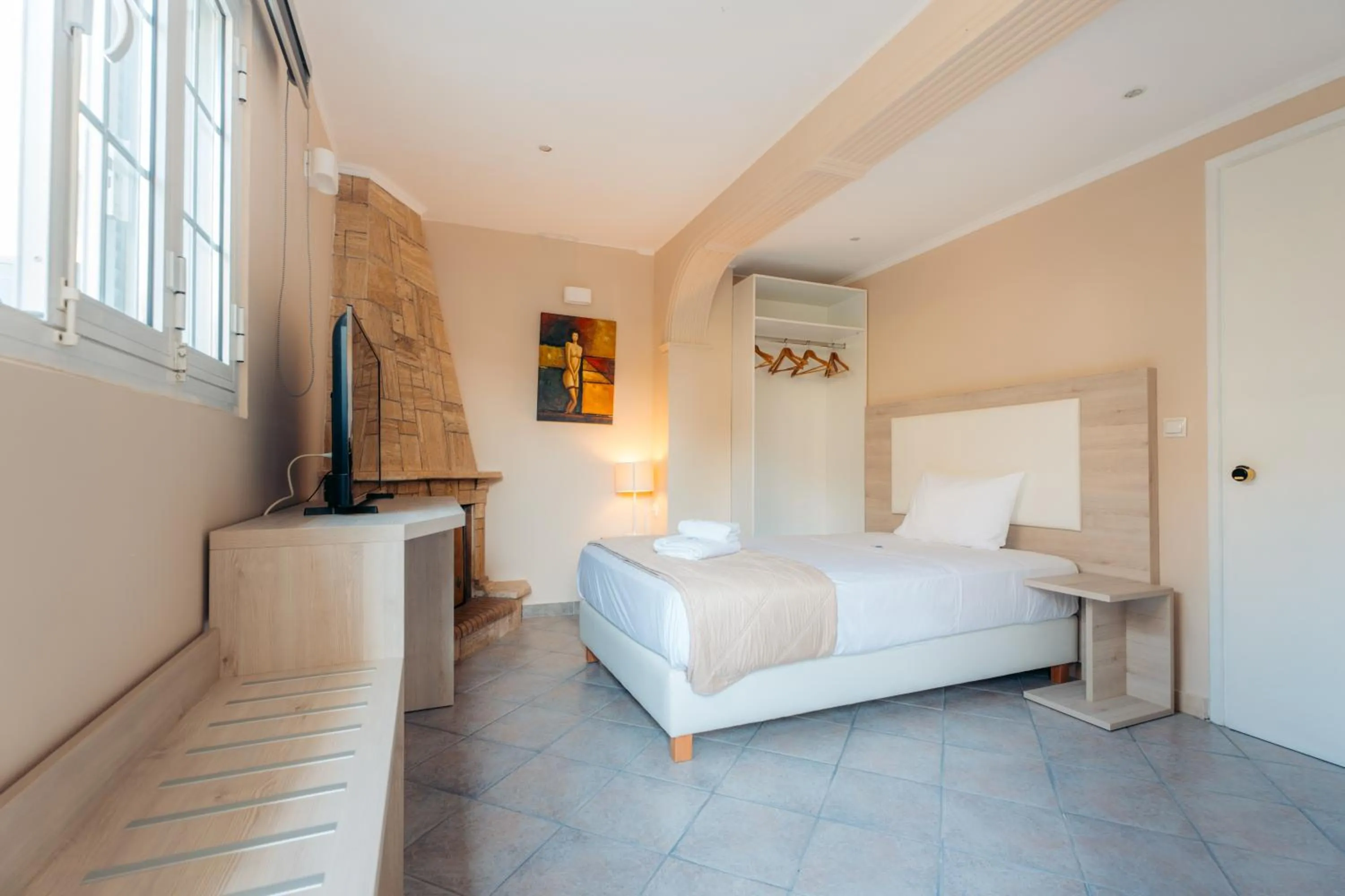 Bed in Planos Beach Hotel