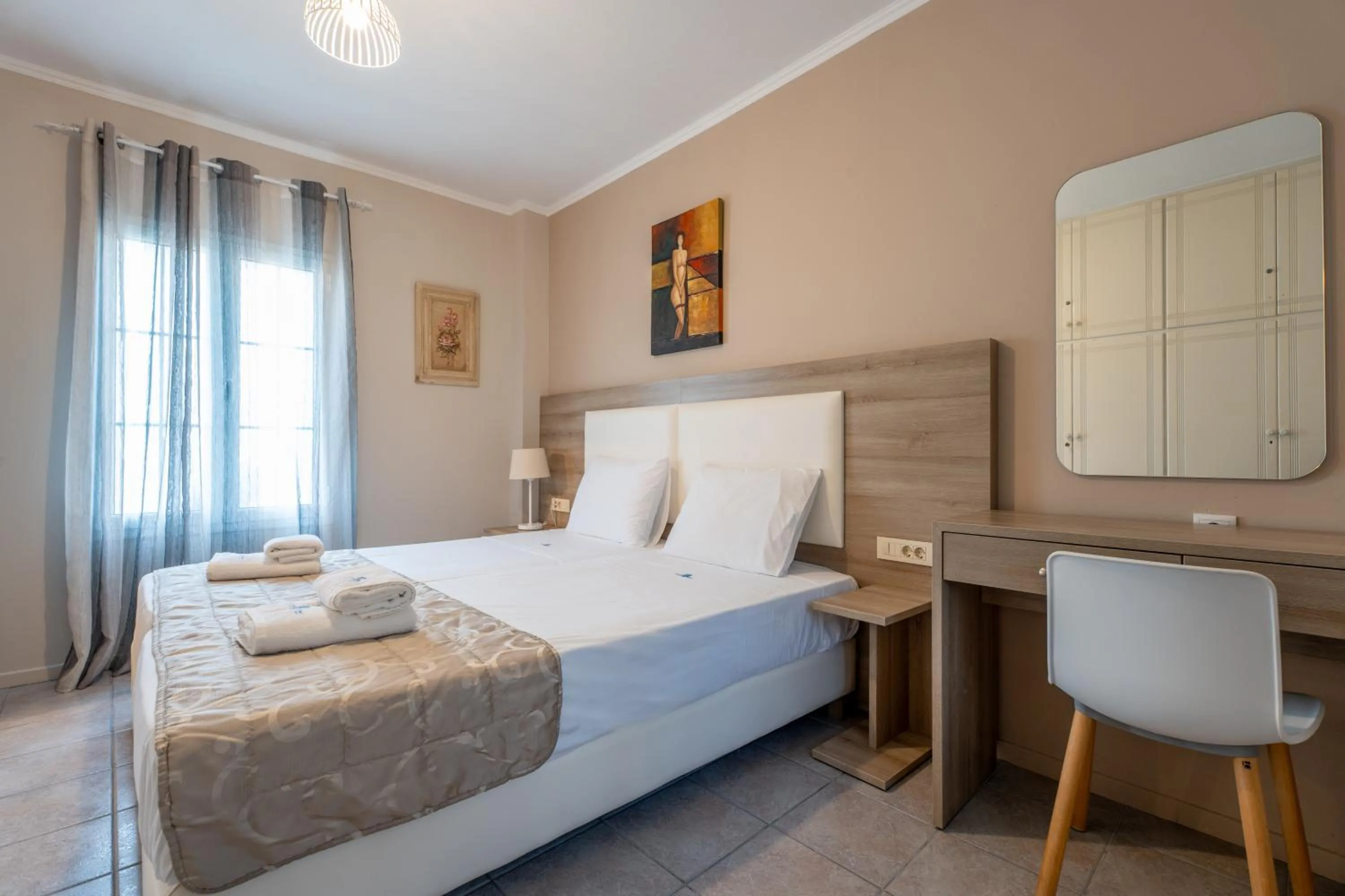 Bed in Planos Beach Hotel