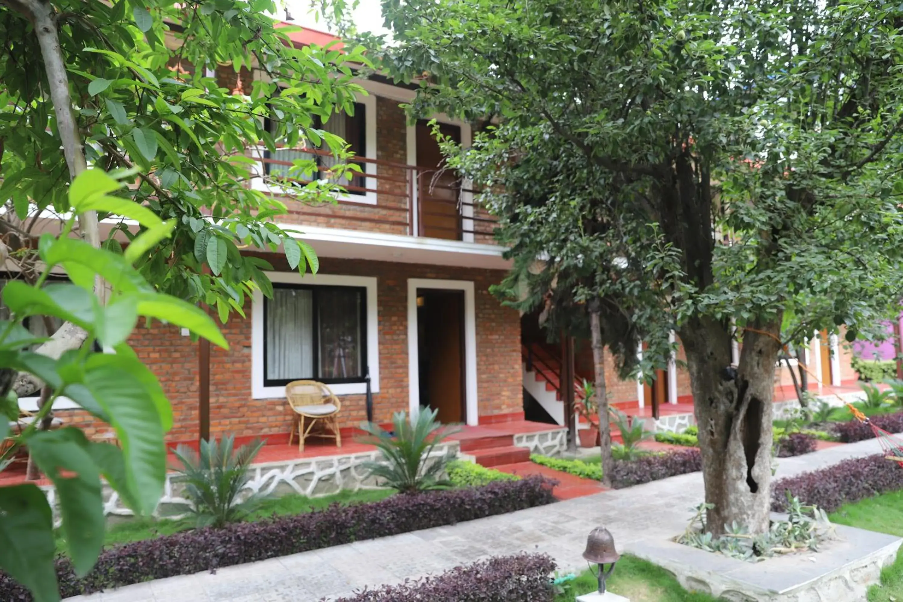 Triple Room with Garden View - single occupancy - Flexible Checkin Time in Nepal Cottage Resort Triple Room with Garden View - single occupancy - Flexible Checkin Time in Nepal Cottage Resort