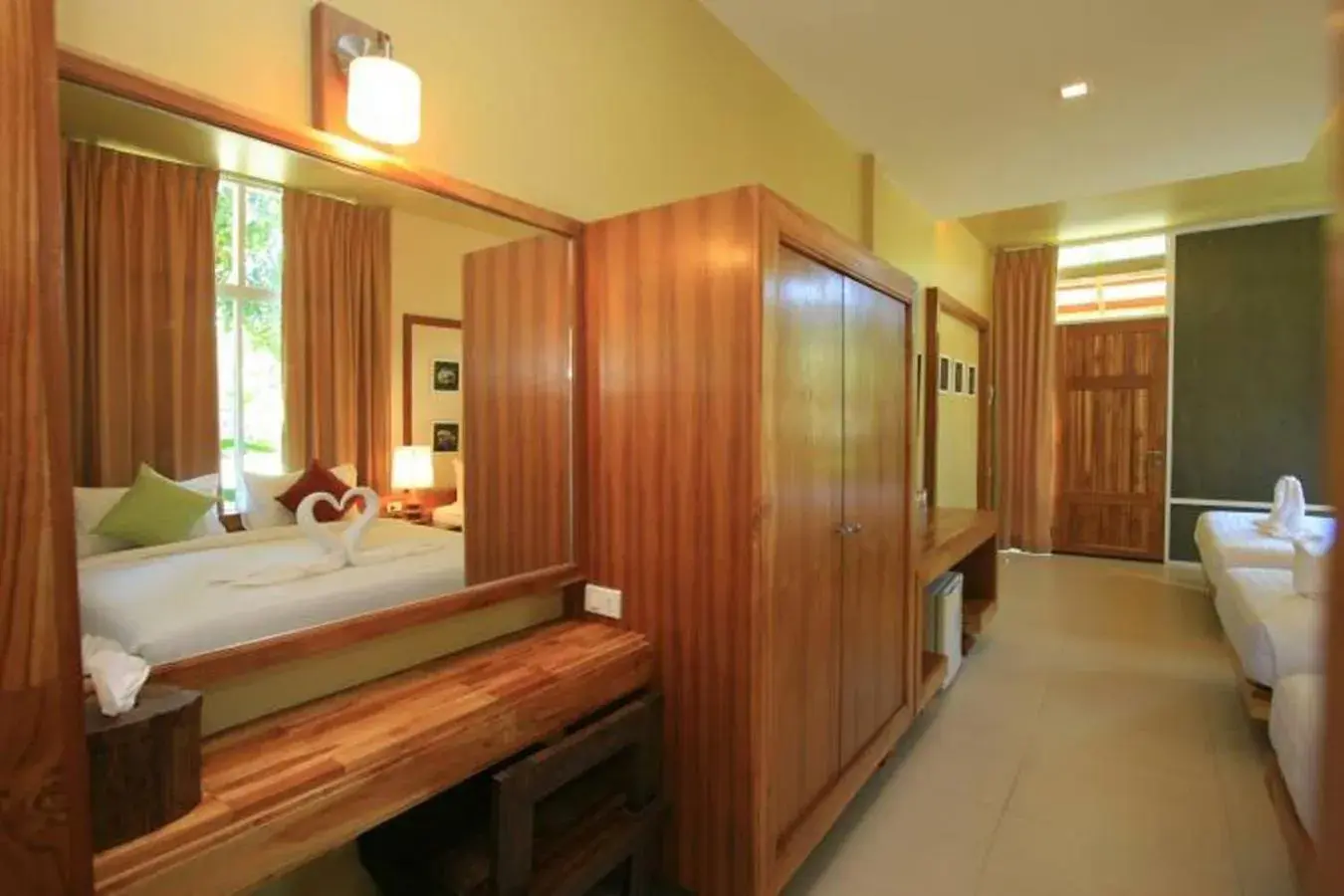 Bed, Bathroom in Nana Resort Kaeng Krachan - SHA Plus Certified