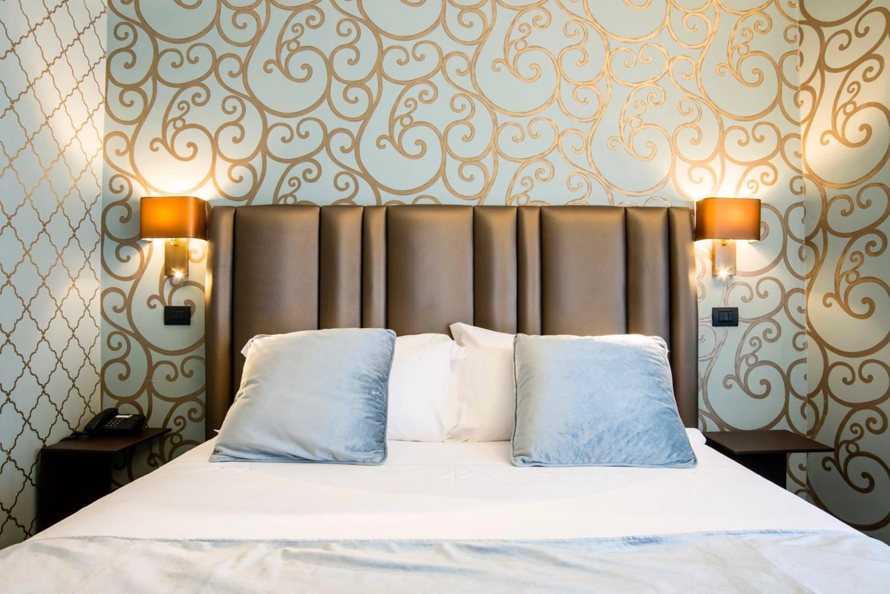 Decorative detail, Bed in Via Veneto Suites