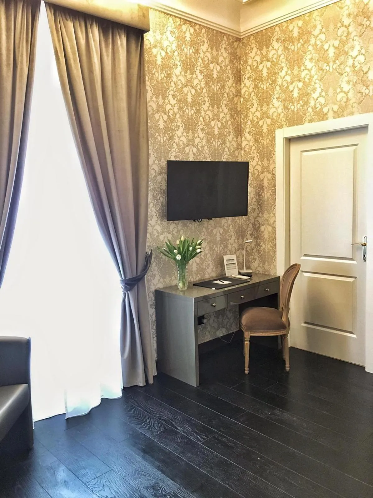 Decorative detail, Bed in Via Veneto Suites