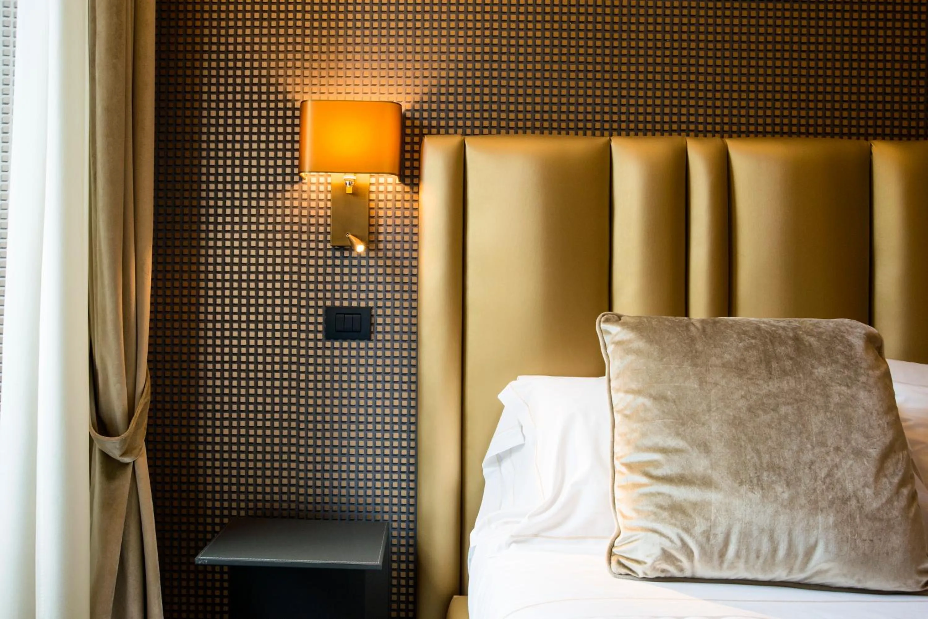 Decorative detail, Bed in Via Veneto Suites