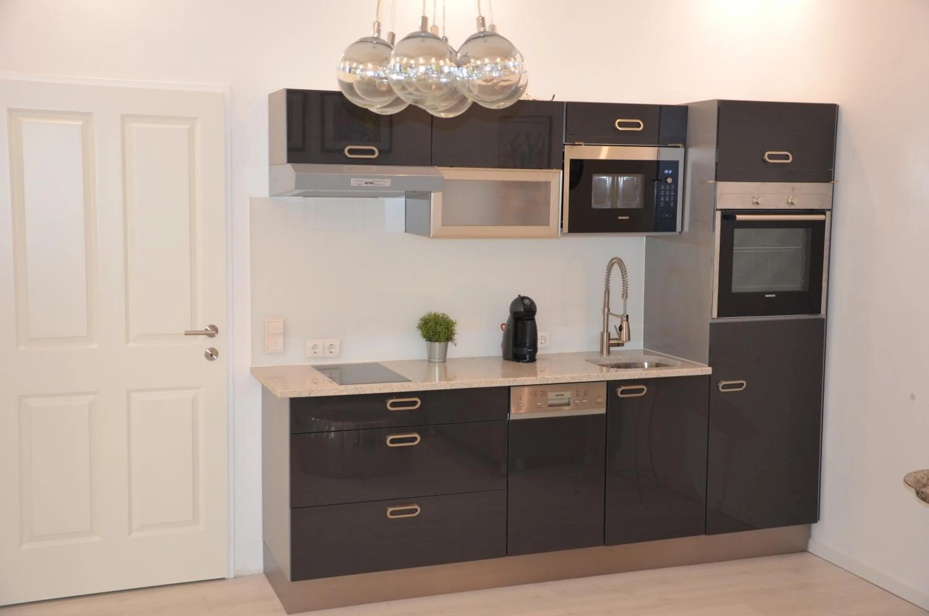 Kitchen or kitchenette in Modern City Apt, next to Metro