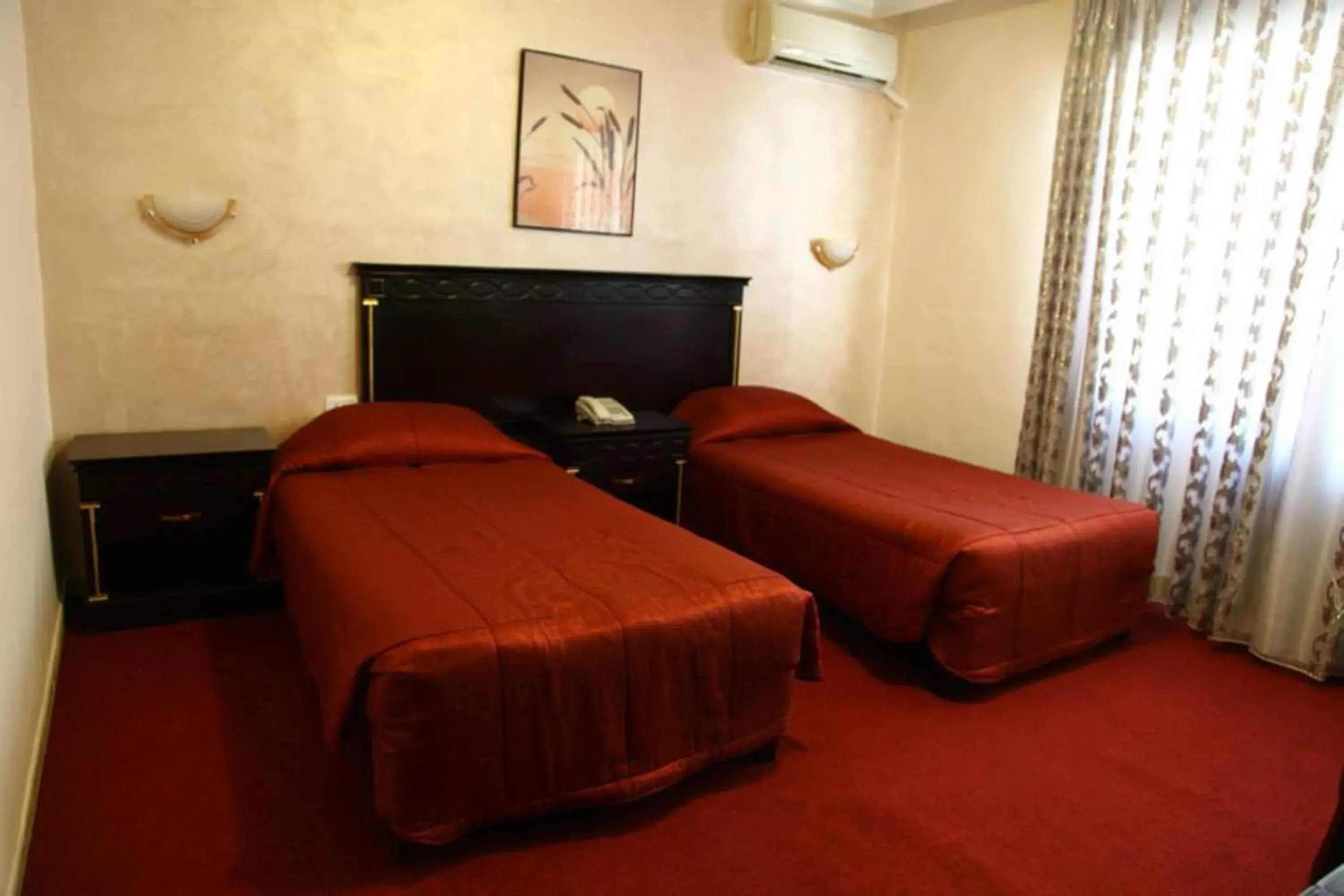 Living room, Bed in Gardens Hotel Amman