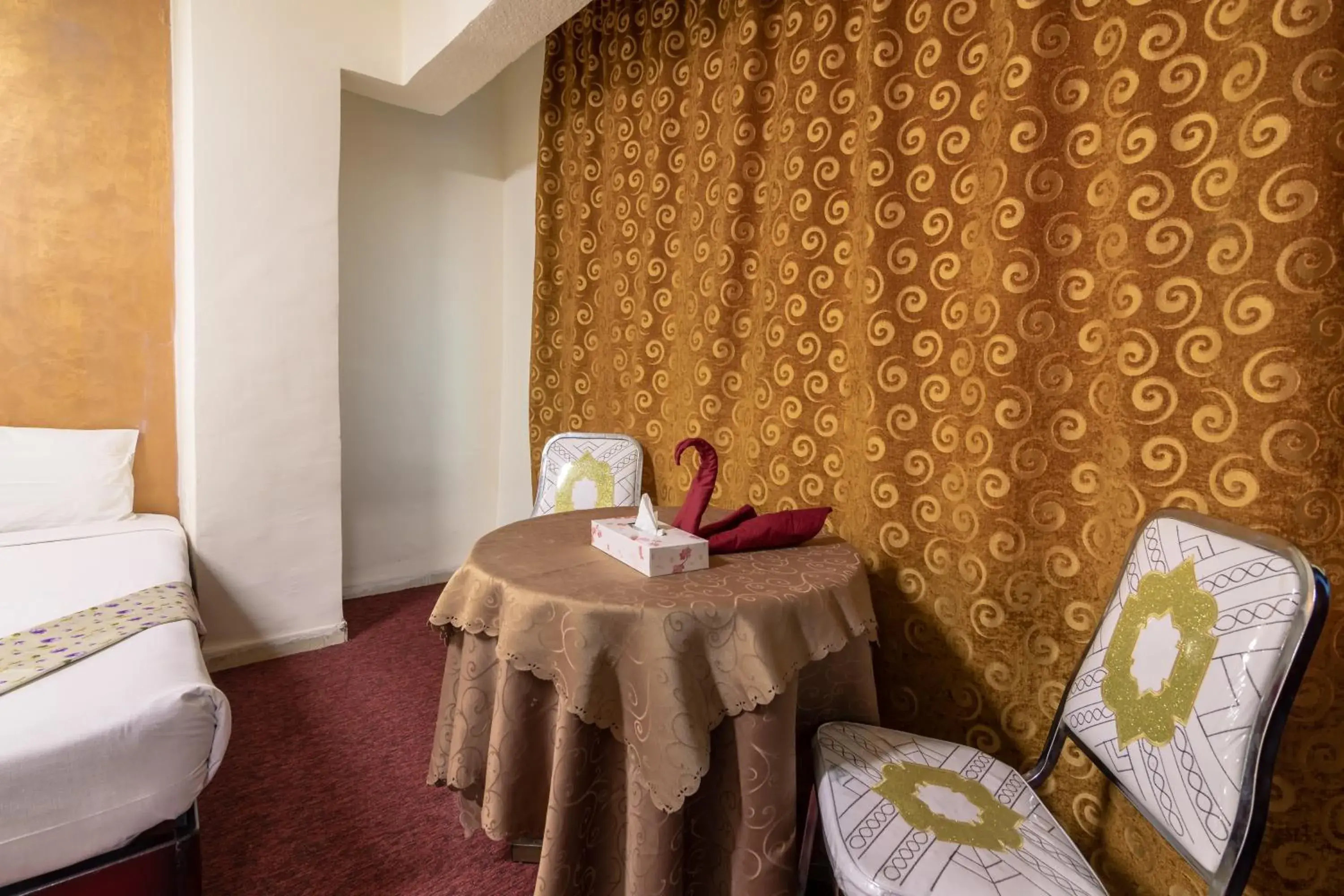 Bedroom, Seating Area in Gardens Hotel Amman