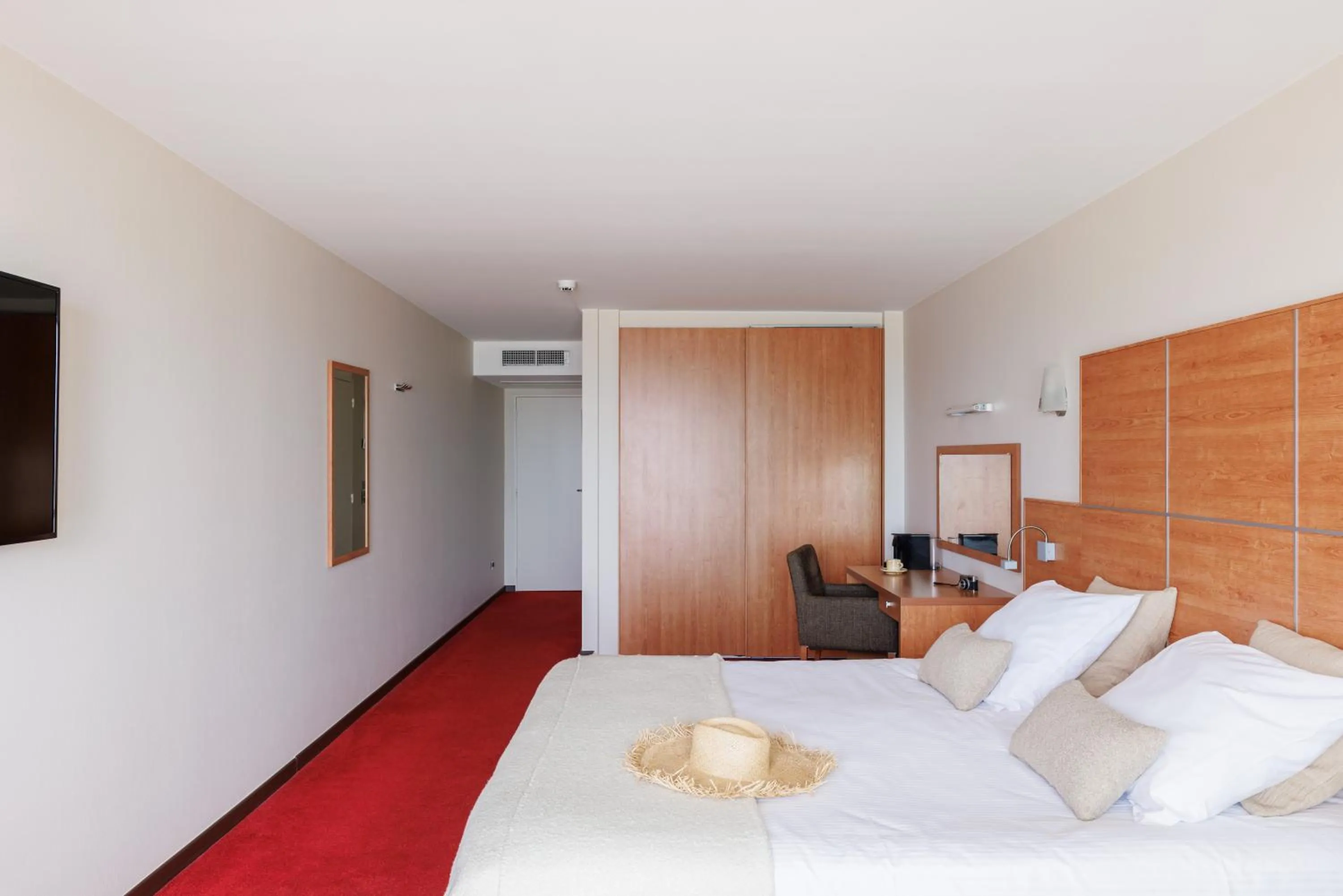 Bed in Hotel Riant-Séjour by WP Hotels