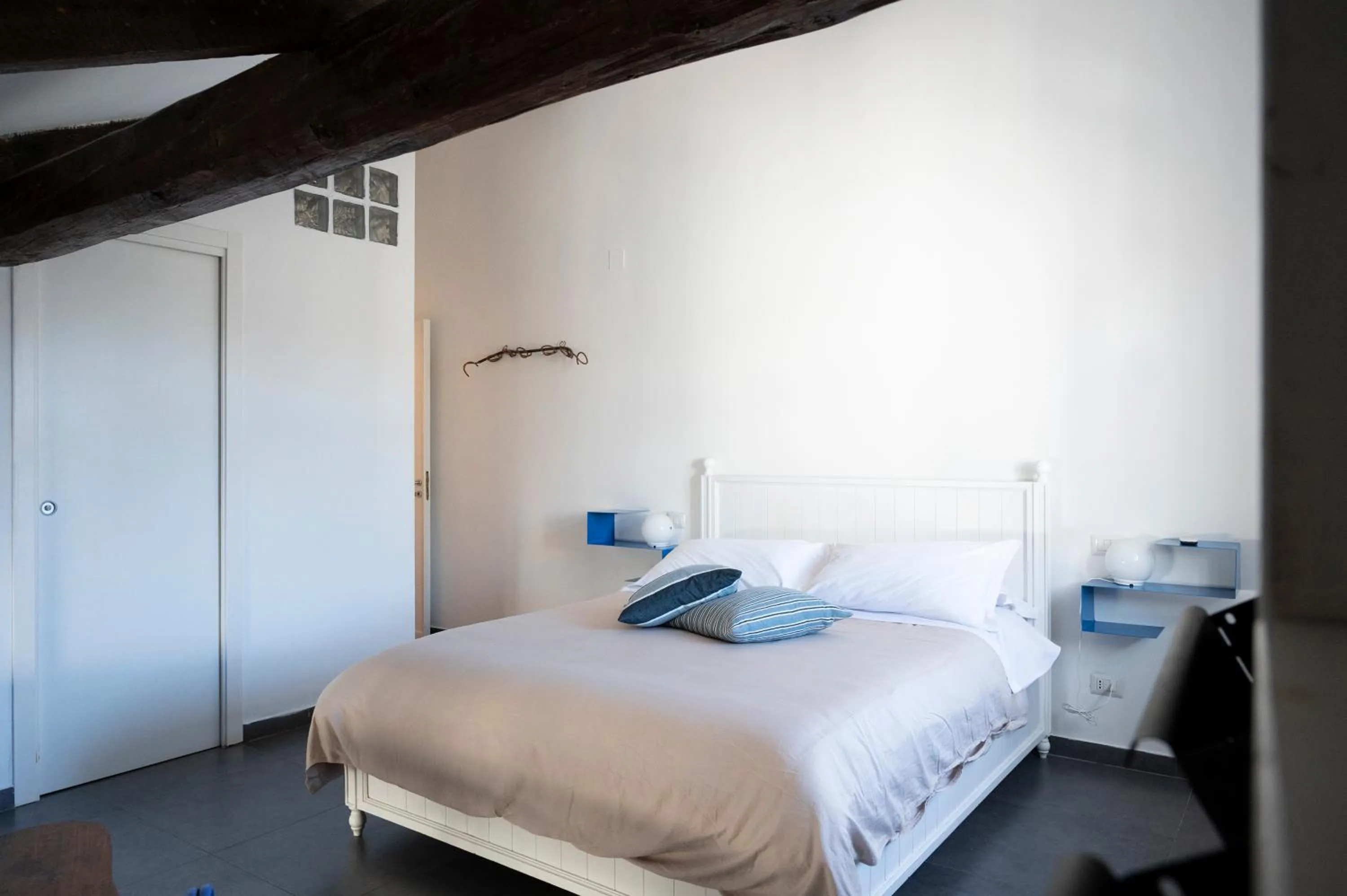 Decorative detail, Bed in Palazzo della Loggia B&B