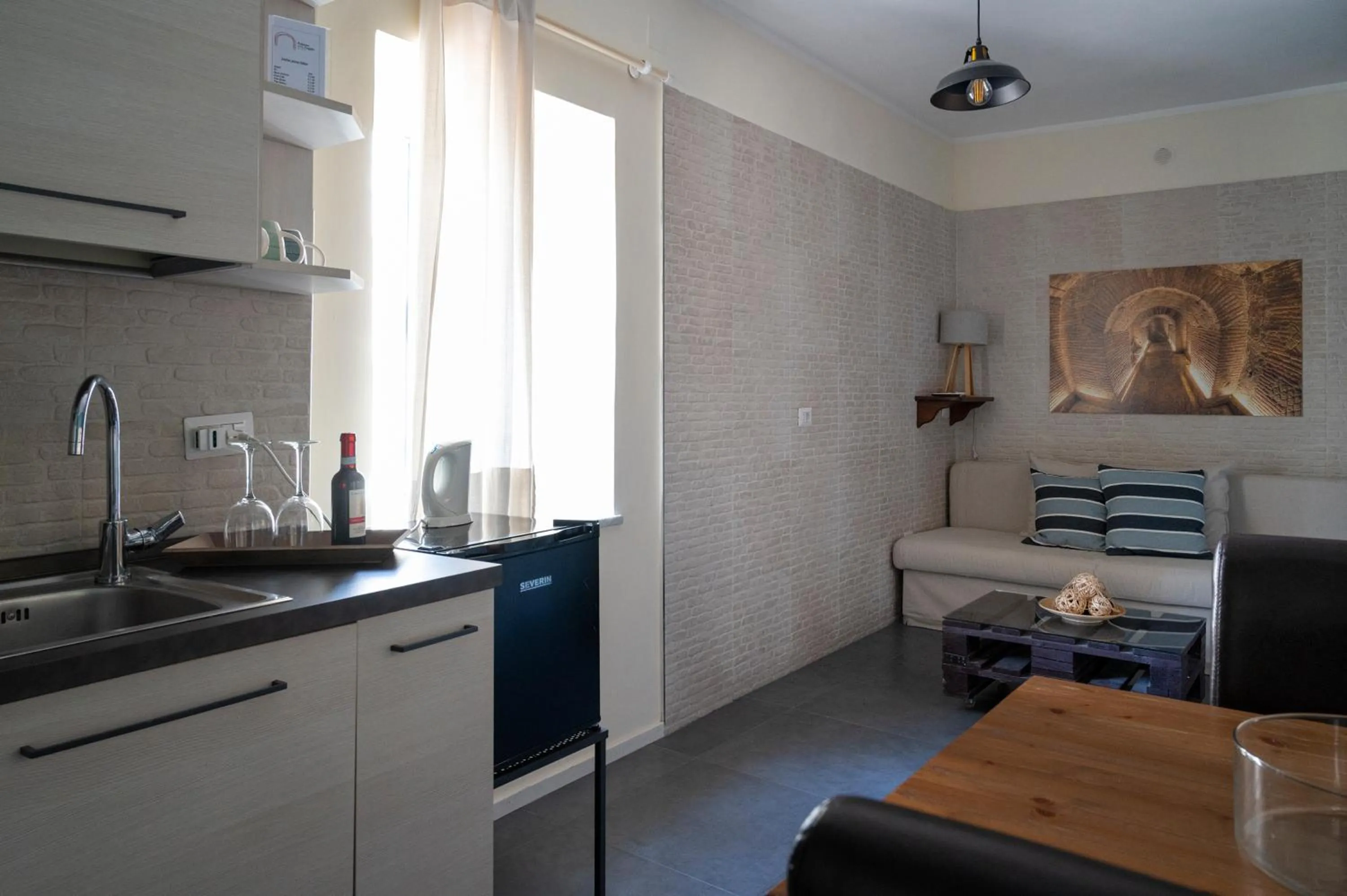 Kitchen or kitchenette in Palazzo della Loggia B&B