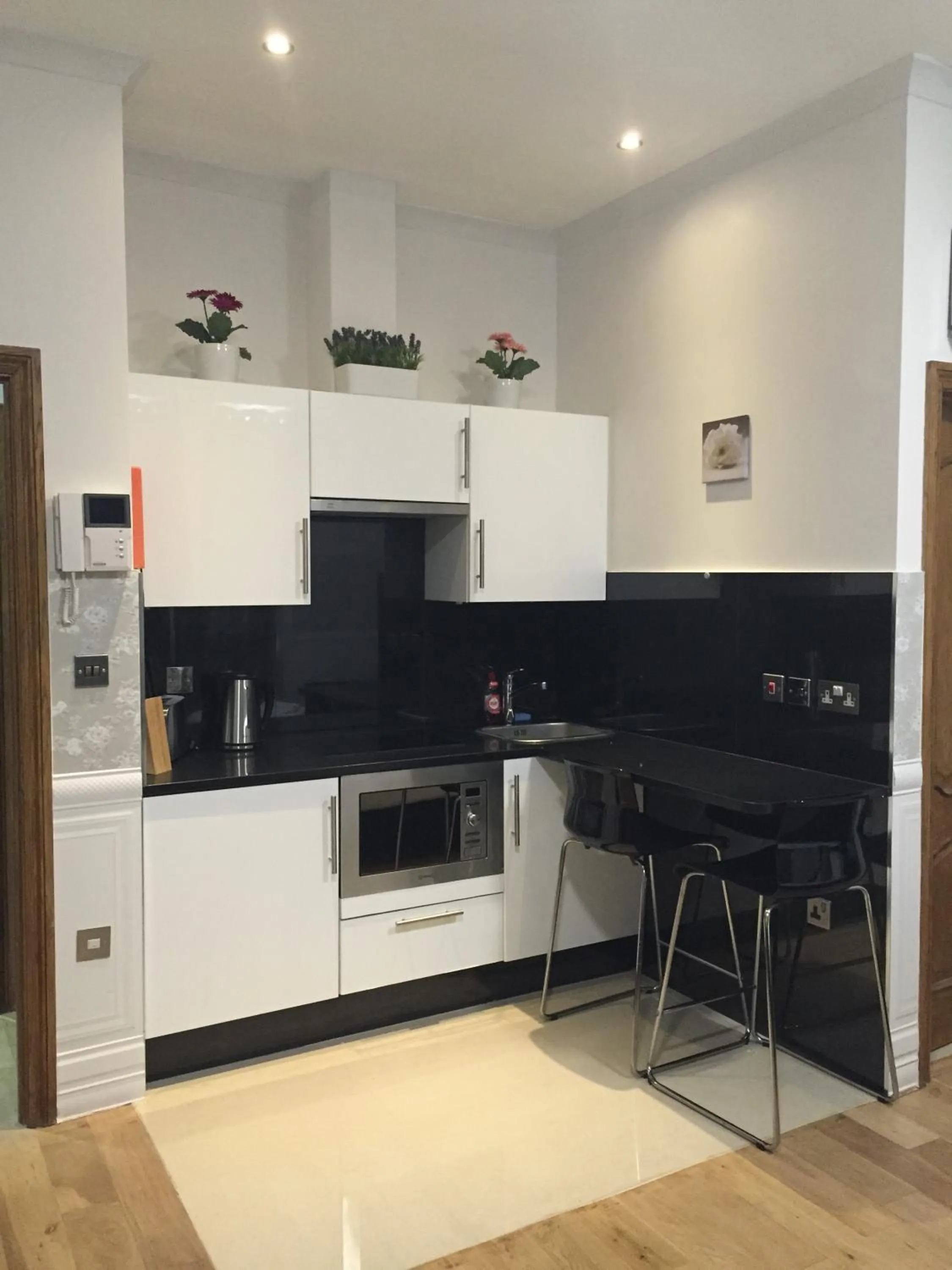 Kitchen or kitchenette in Paddington Apartments