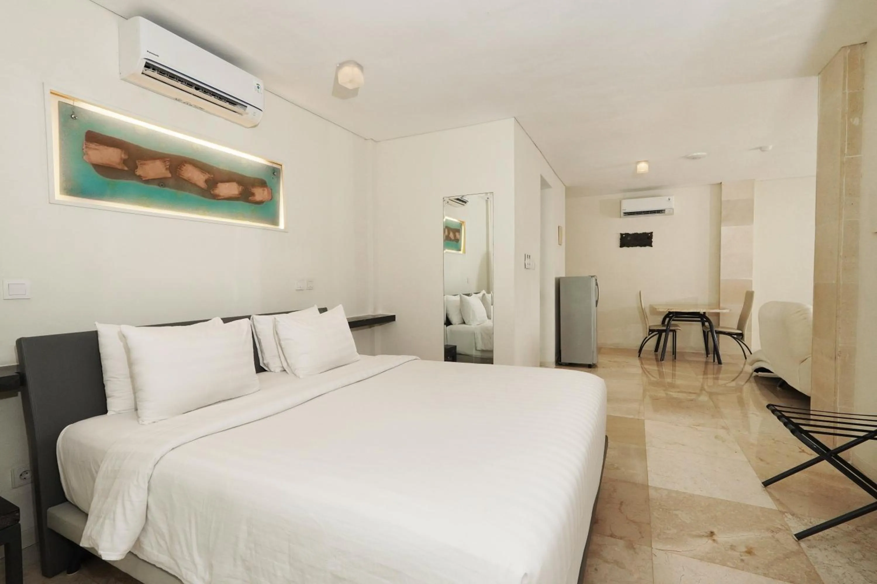 Bed in FuramaXclusive Ocean Beach Seminyak Bali