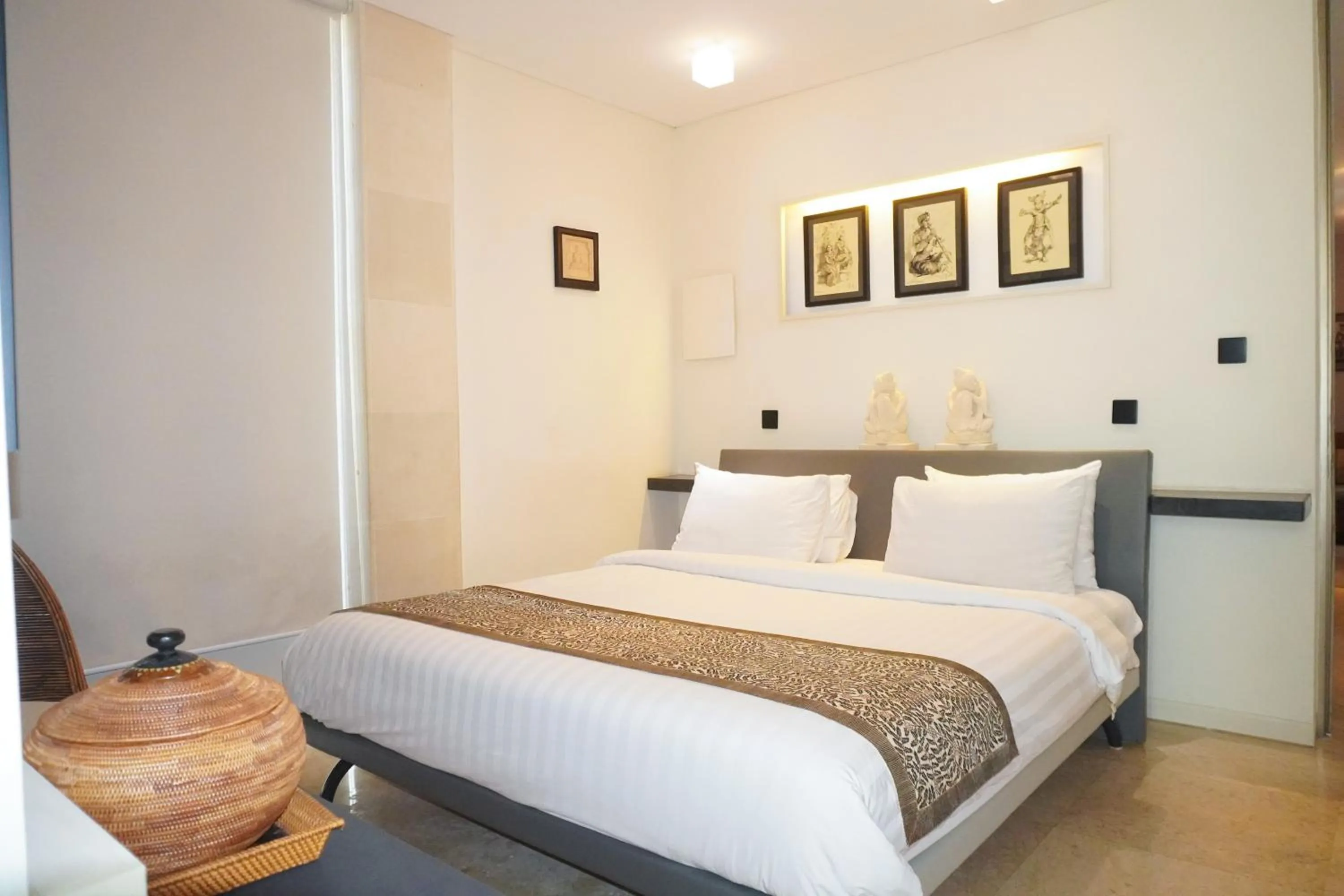 Bed in FuramaXclusive Ocean Beach Seminyak Bali