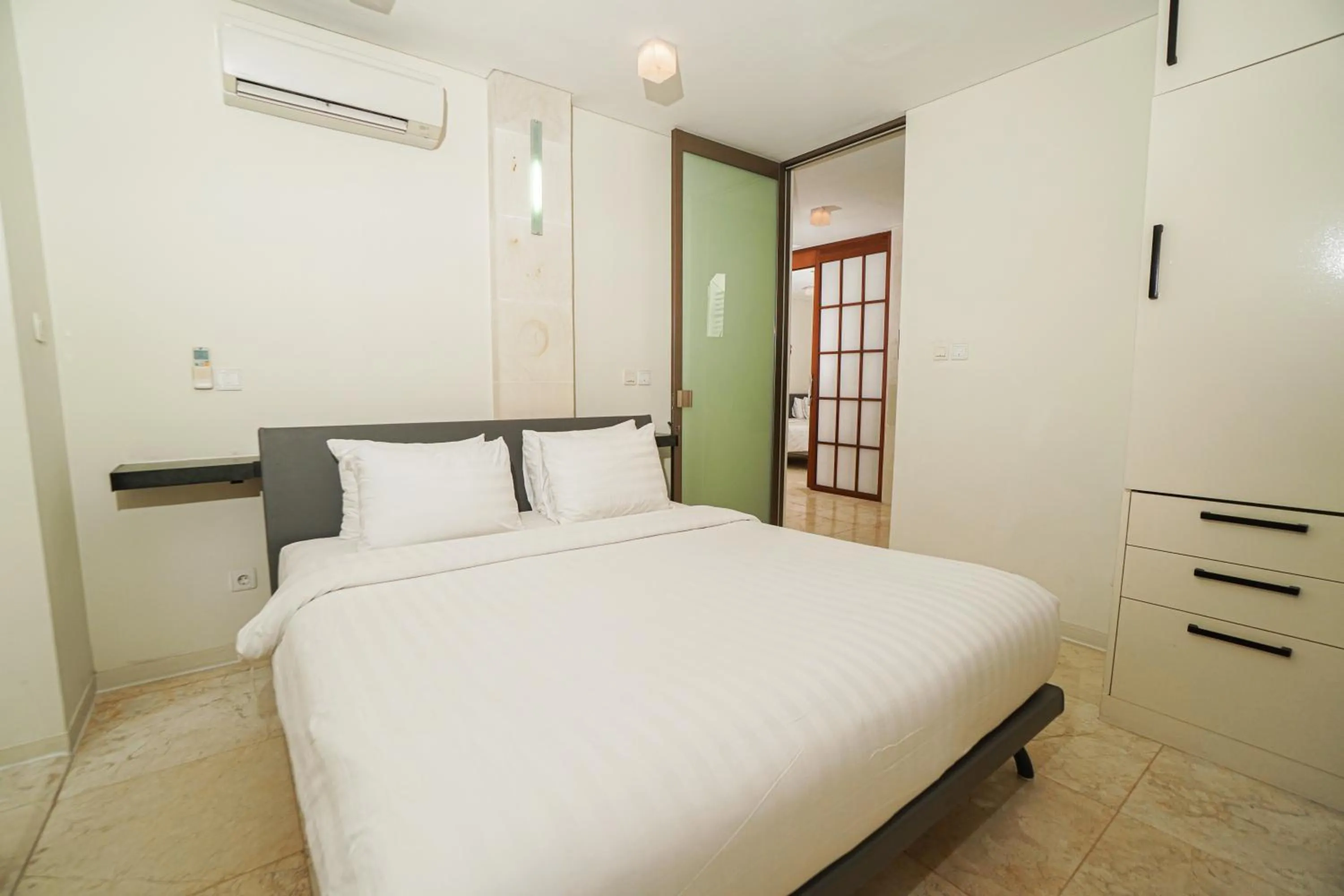 Bed in FuramaXclusive Ocean Beach Seminyak Bali