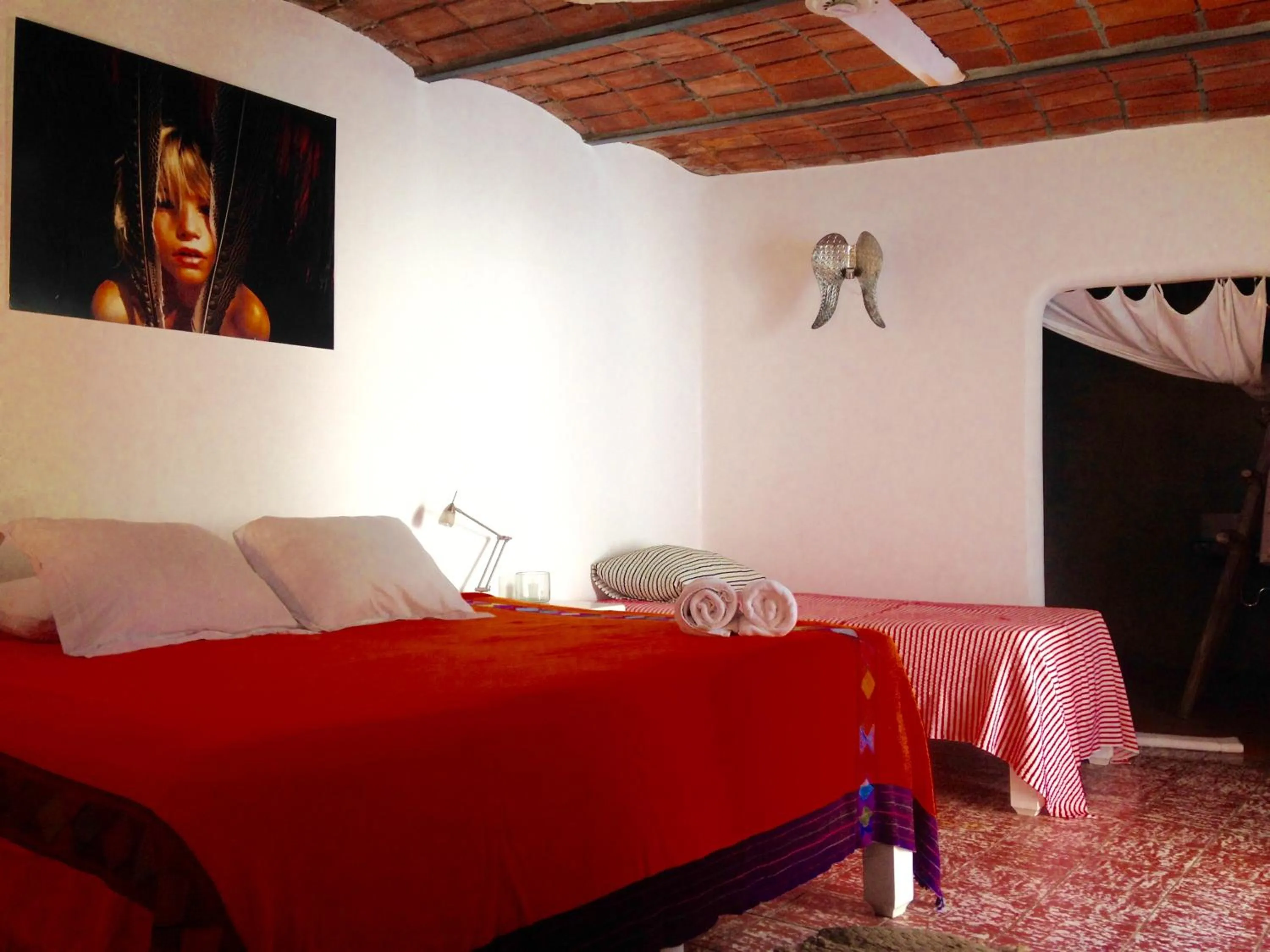 Bed in Petit Hotel Hafa