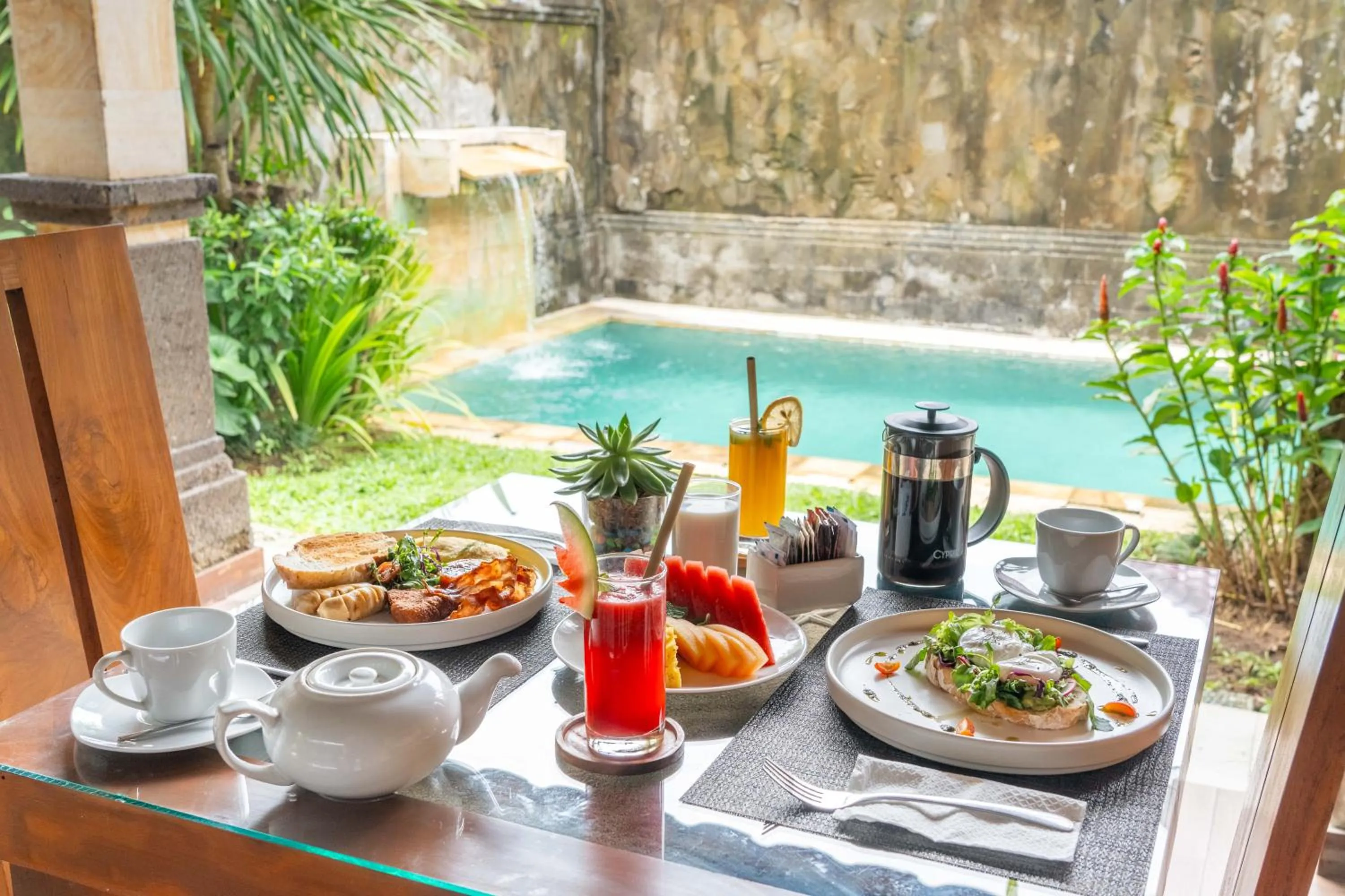 Dining area in Bali Prime Villas Seminyak by Kanaya Hospitality