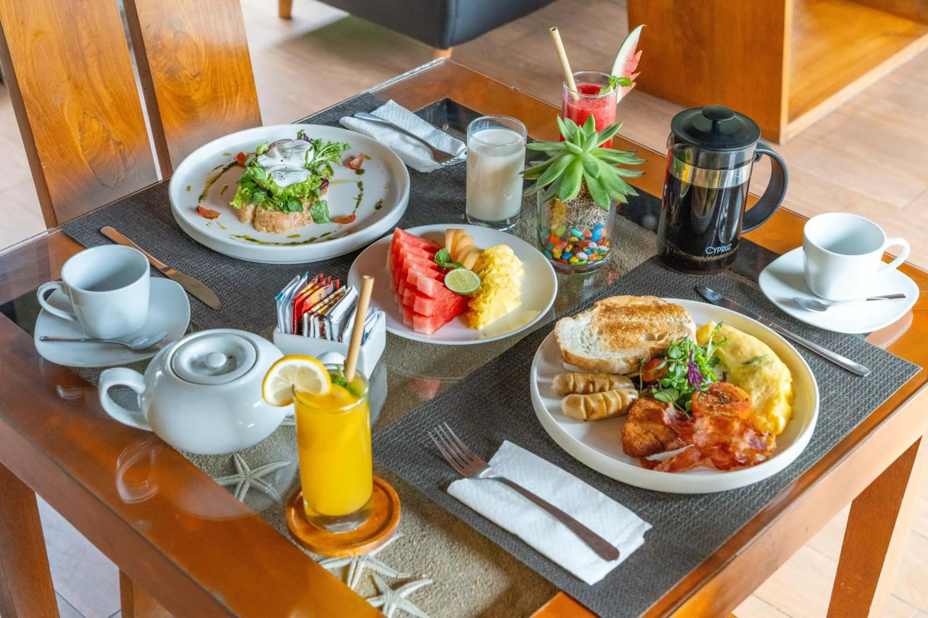 Dining area in Bali Prime Villas Seminyak by Kanaya Hospitality