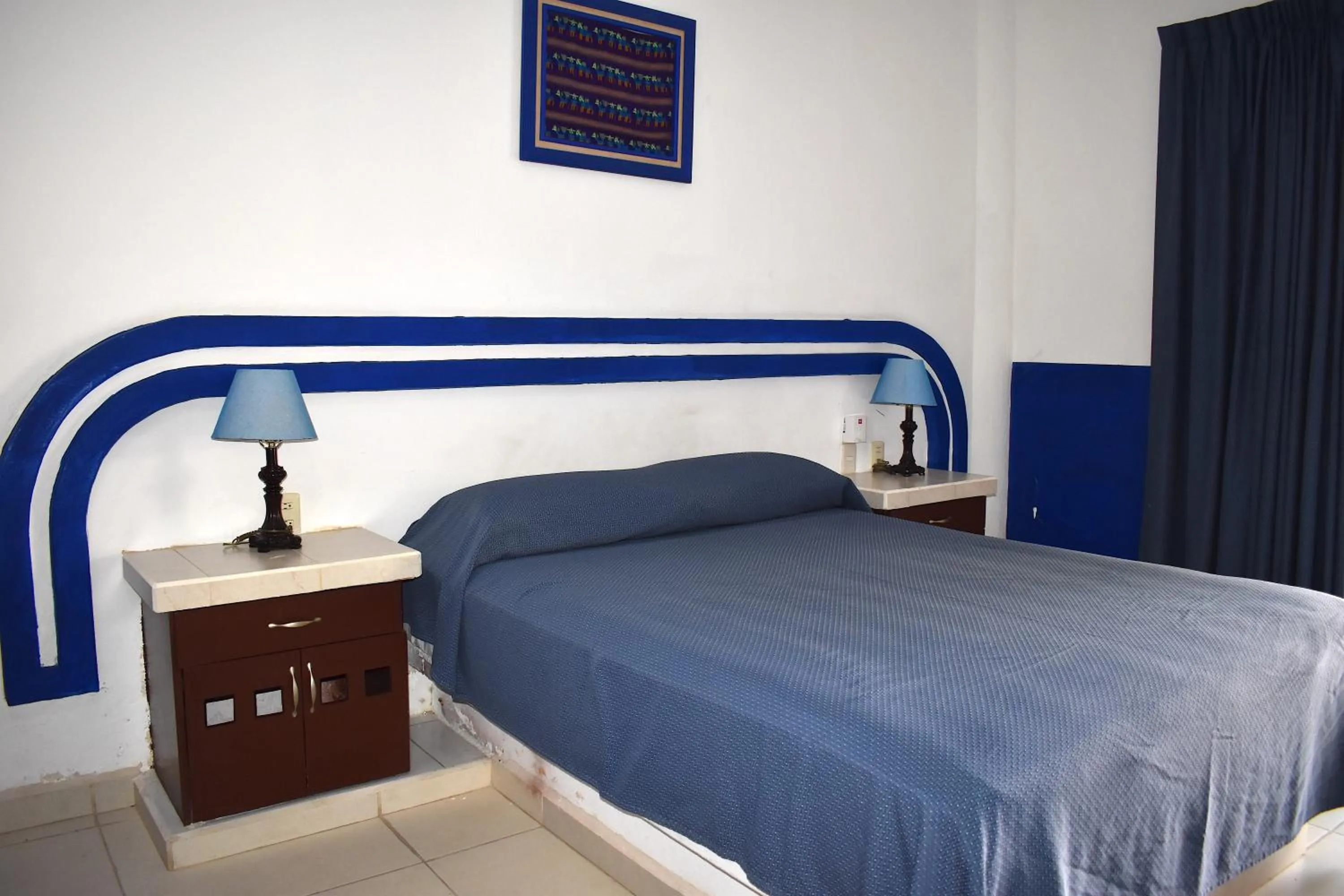 Bed in Plaza Almendros Hotel Isla Mujeres