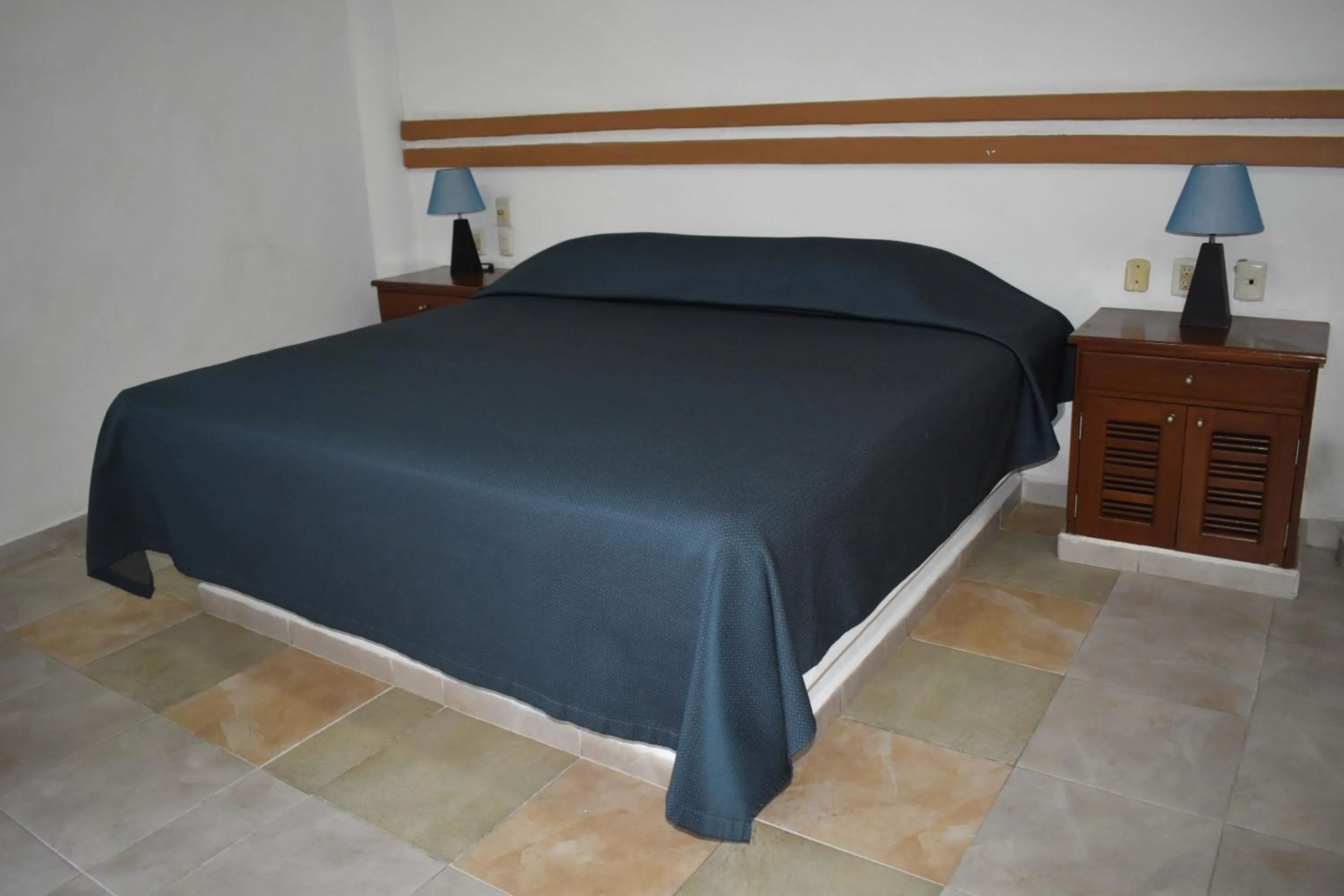 Bed in Plaza Almendros Hotel Isla Mujeres