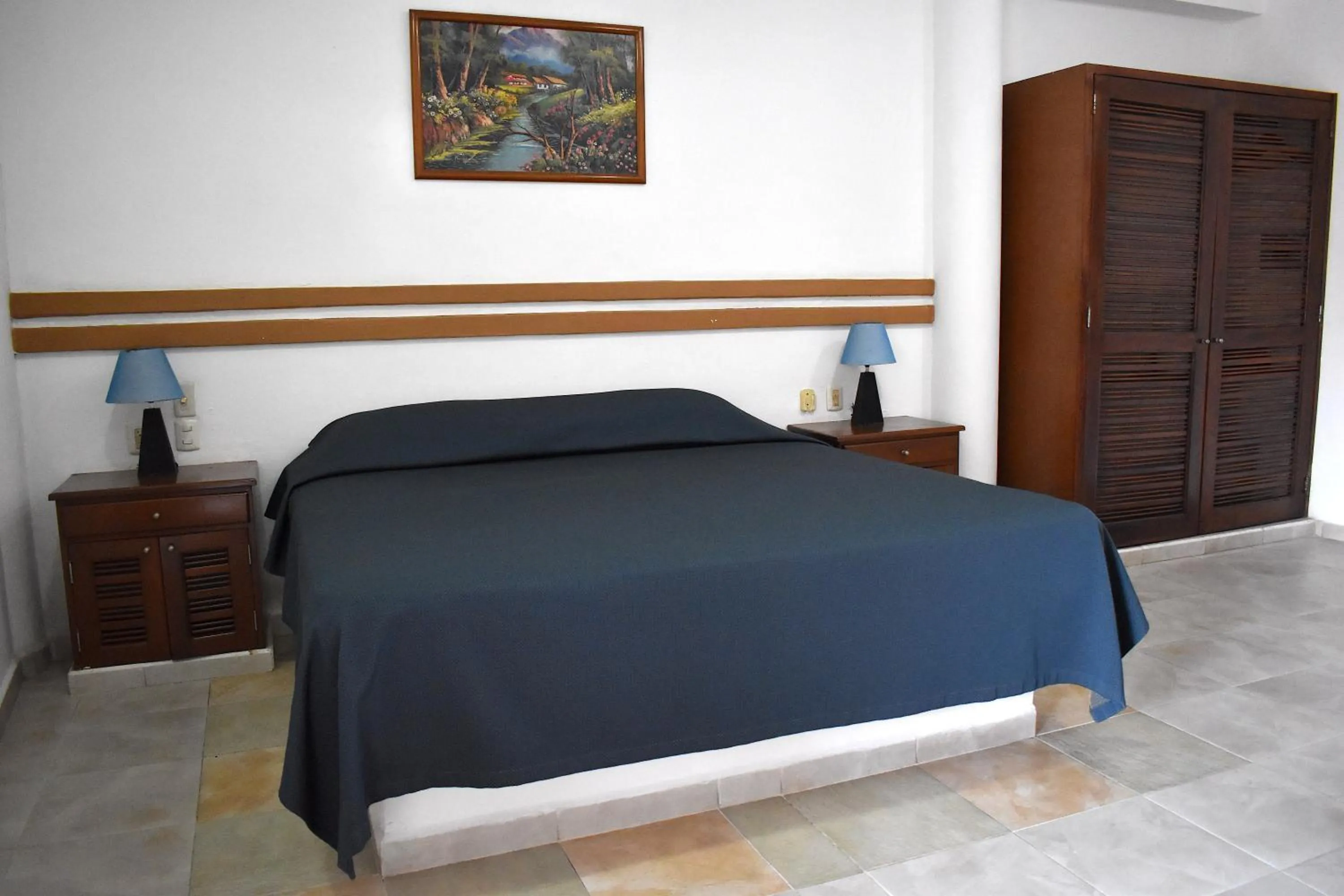 Bed in Plaza Almendros Hotel Isla Mujeres