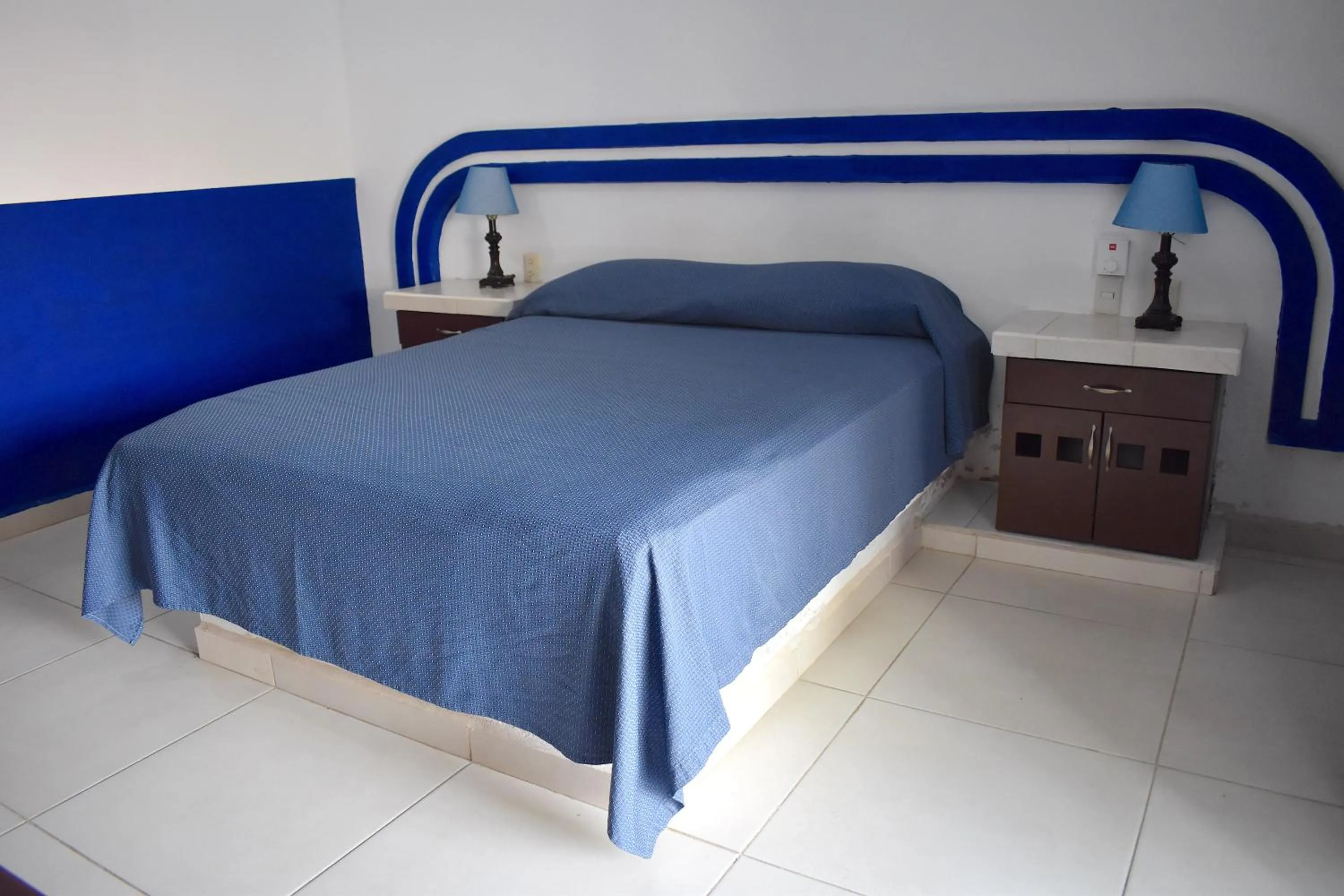 Bed in Plaza Almendros Hotel Isla Mujeres