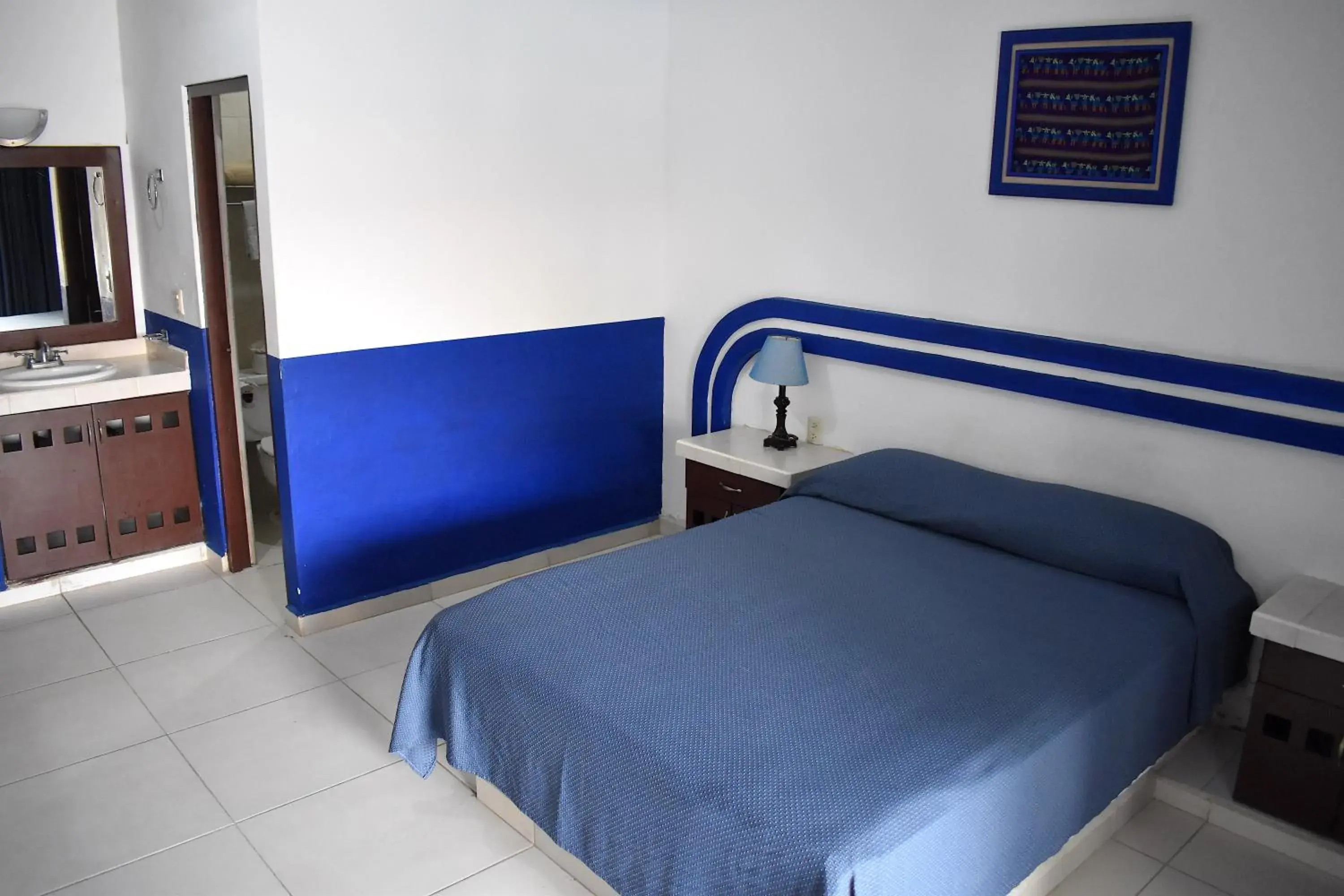 Bed in Plaza Almendros Hotel Isla Mujeres Bed in Plaza Almendros Hotel Isla Mujeres