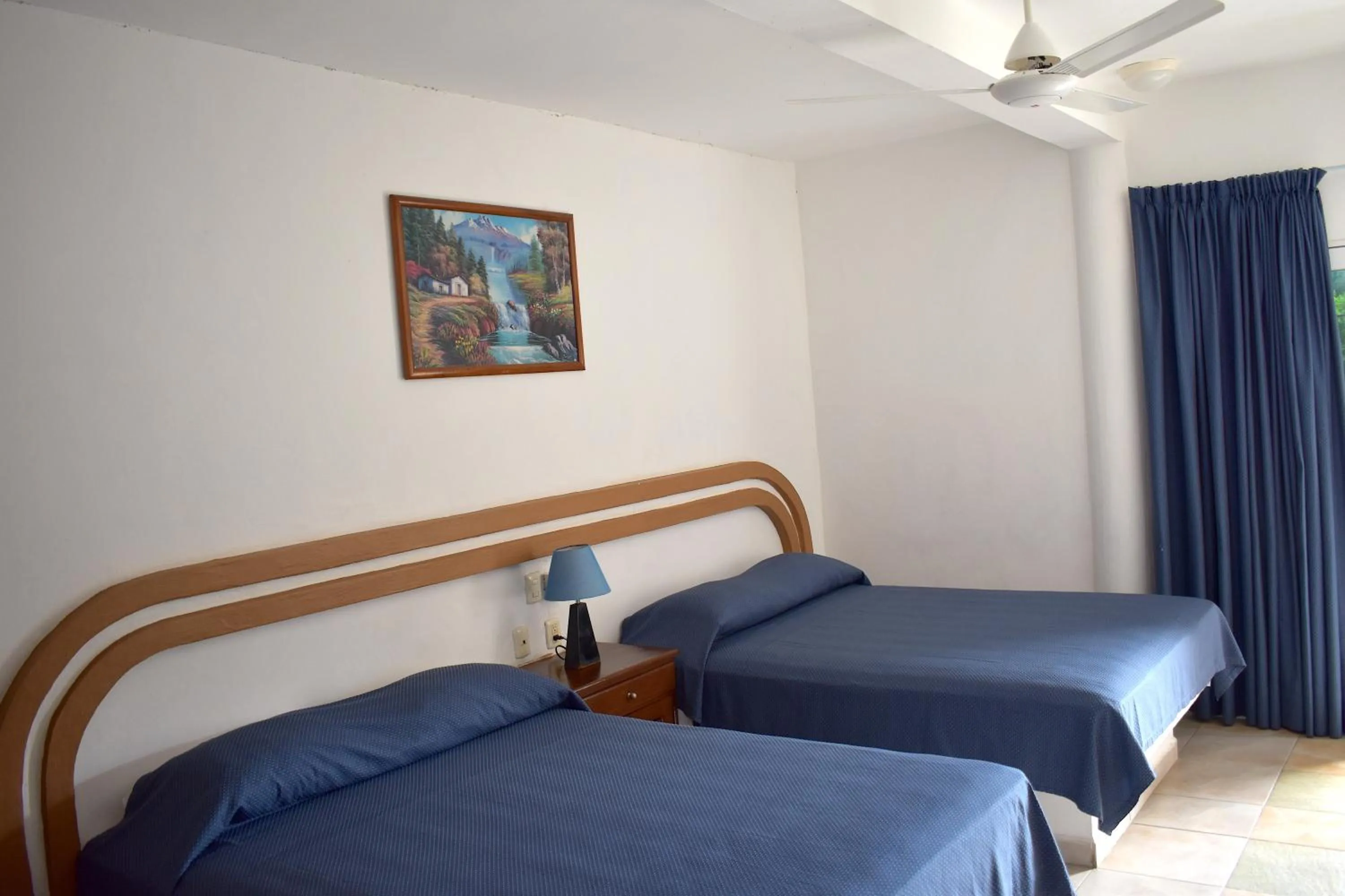 Bed in Plaza Almendros Hotel Isla Mujeres