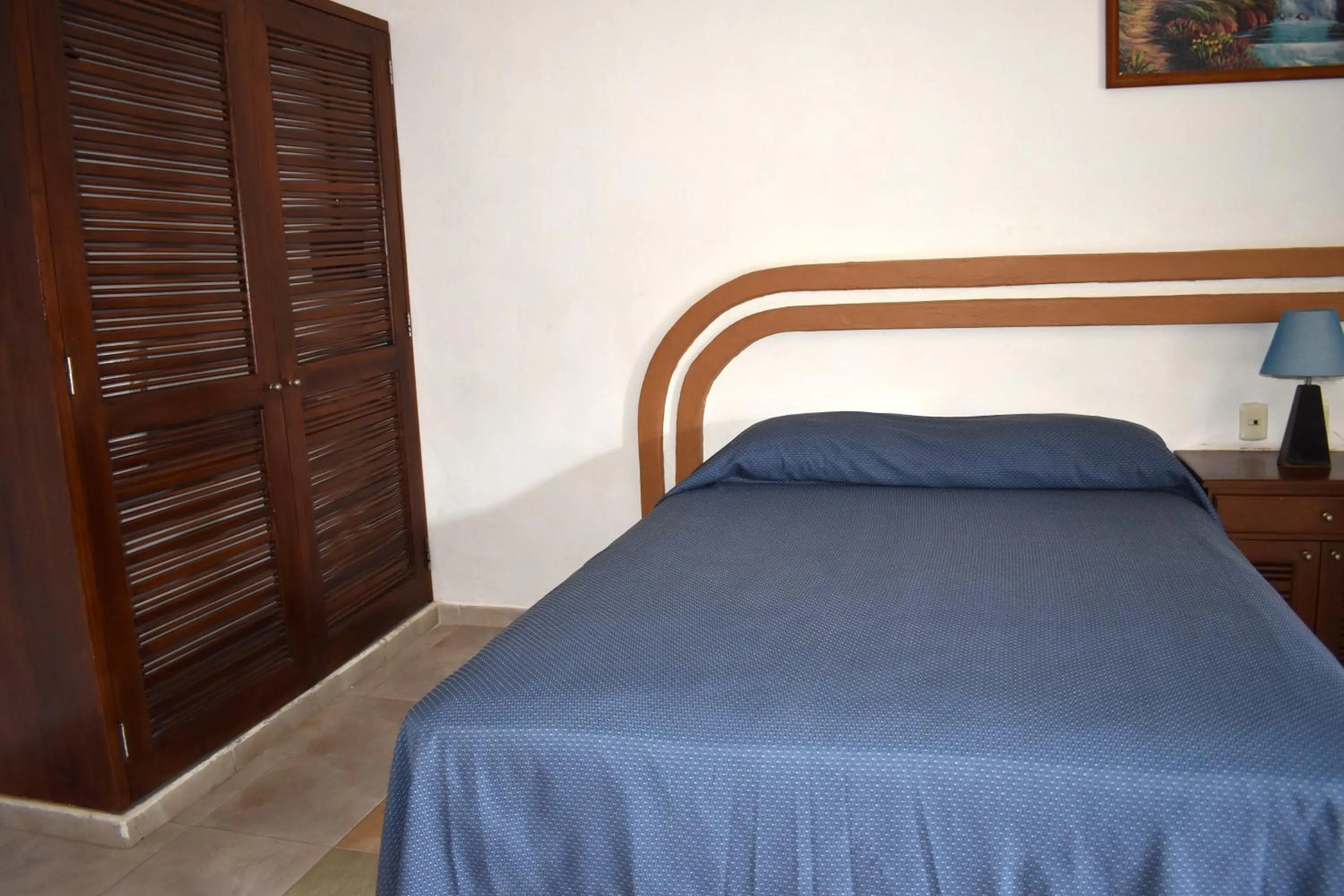 Bed in Plaza Almendros Hotel Isla Mujeres