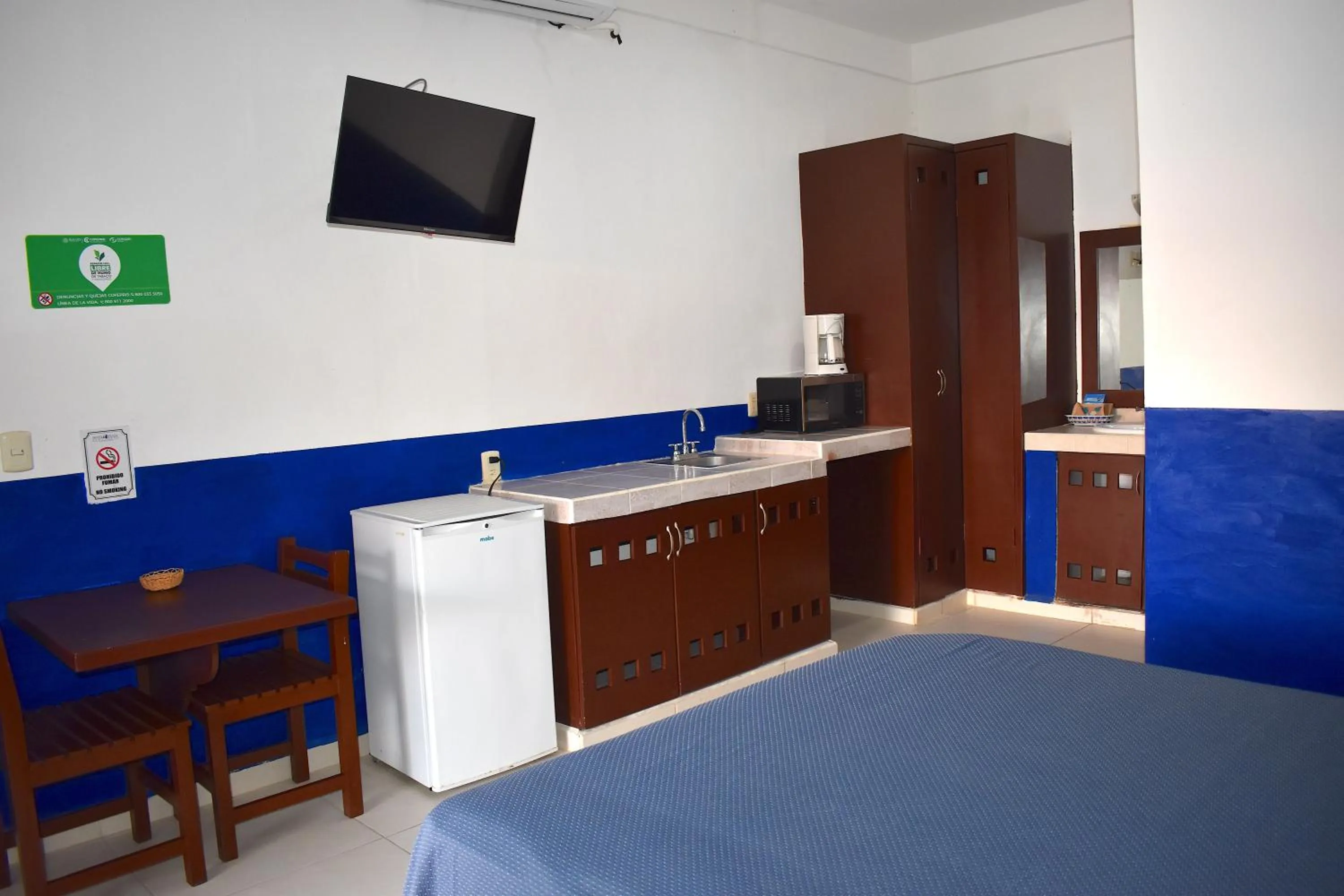 Bed in Plaza Almendros Hotel Isla Mujeres