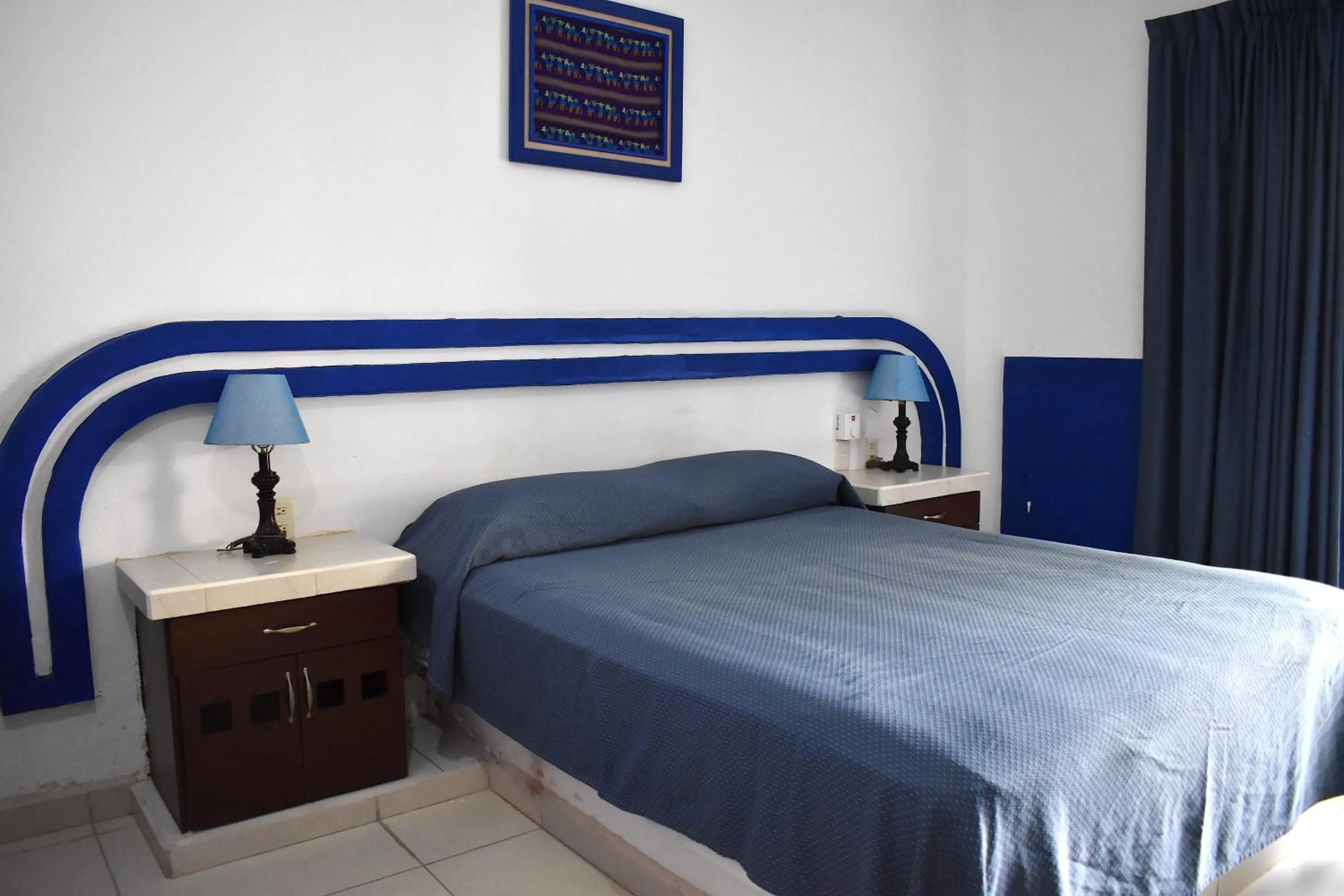 Bed in Plaza Almendros Hotel Isla Mujeres