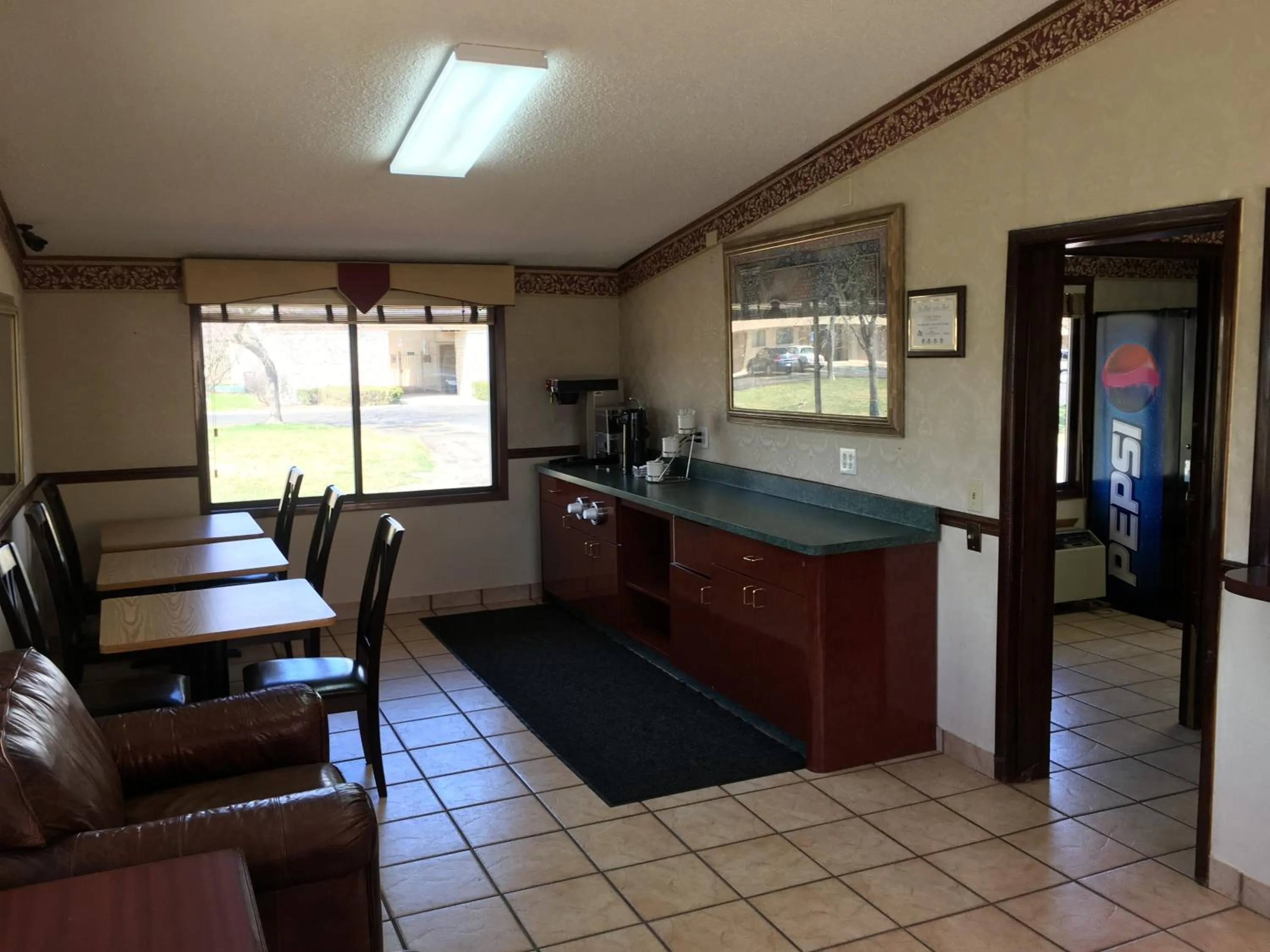 Communal kitchen in Travelodge by Wyndham Monroe