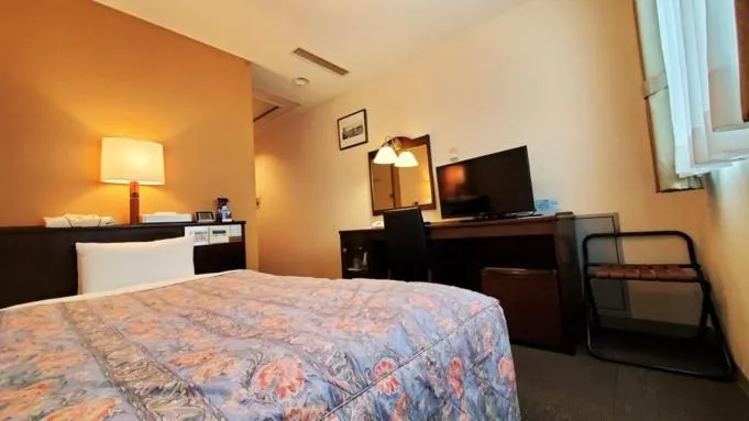 Bed in Nobeoka Urban Hotel