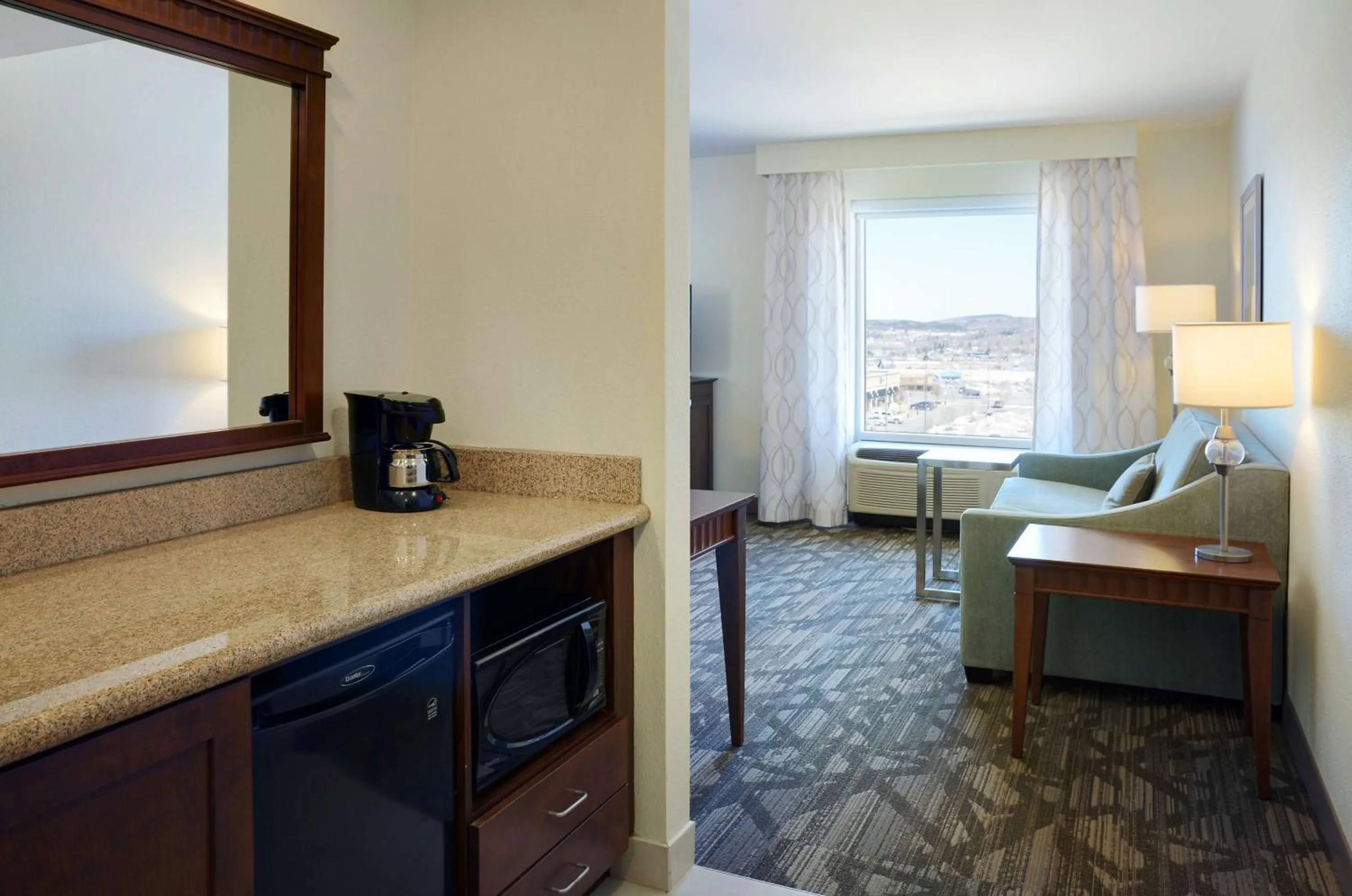 Living room, Bed in Hampton Inn & Suites Saint John