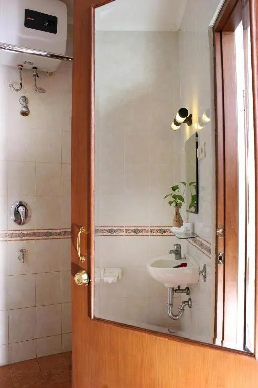 Bathroom in MMUGM Hotel