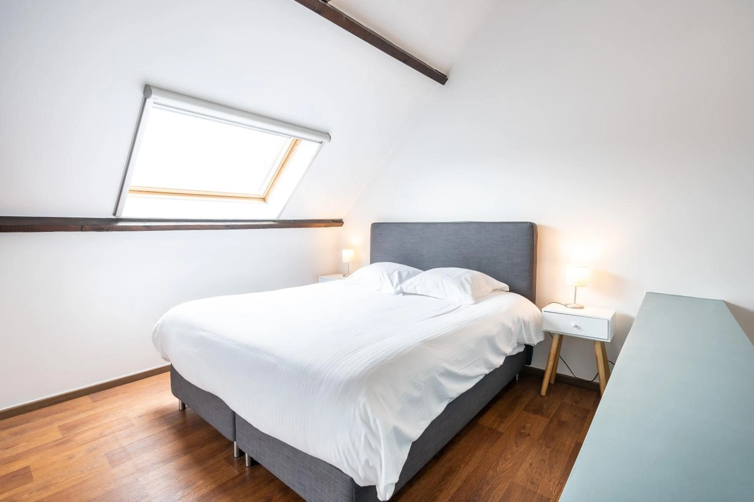 Bed in The Rose Suites