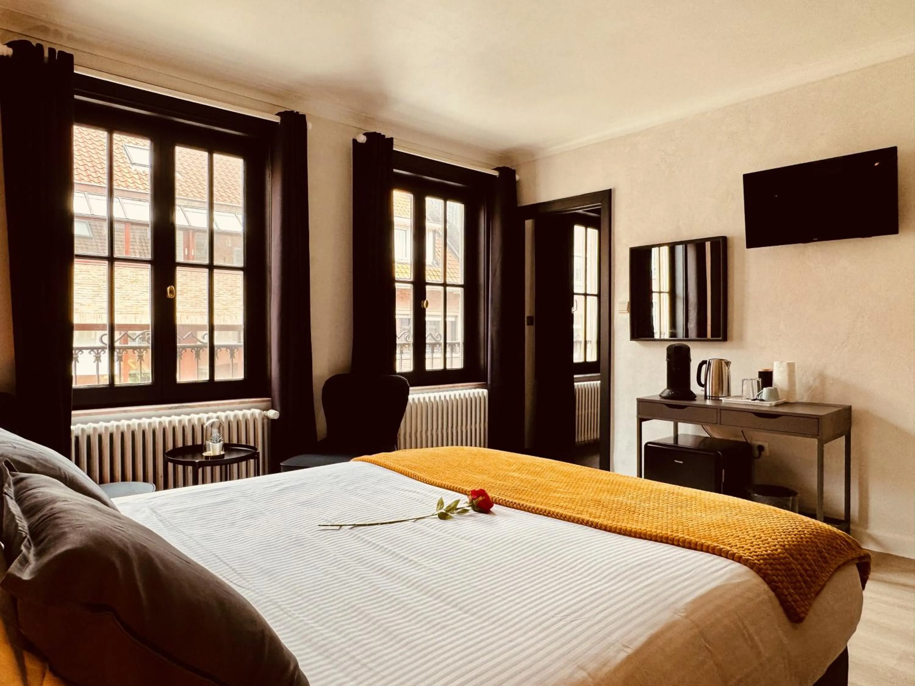 Bed in The Rose Suites