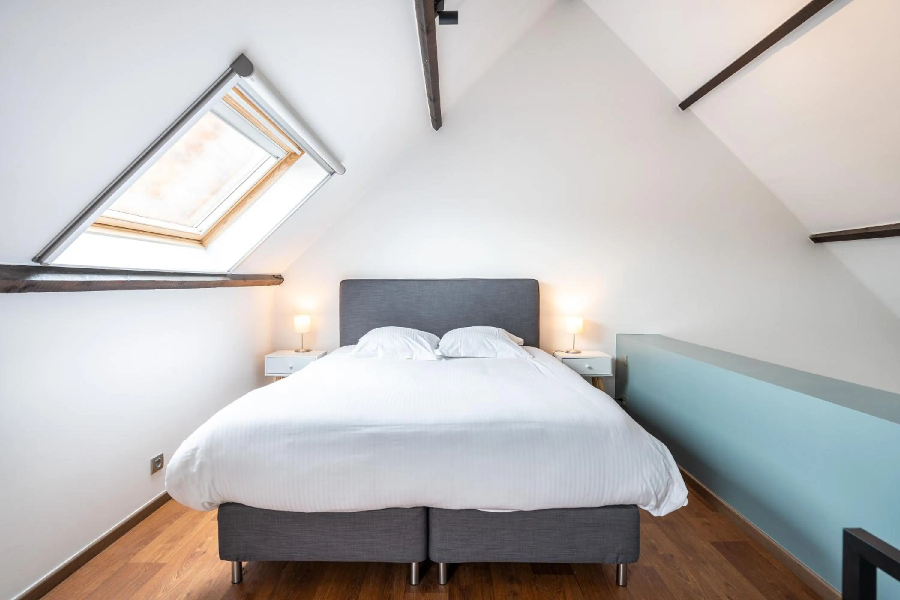 Bed in The Rose Suites