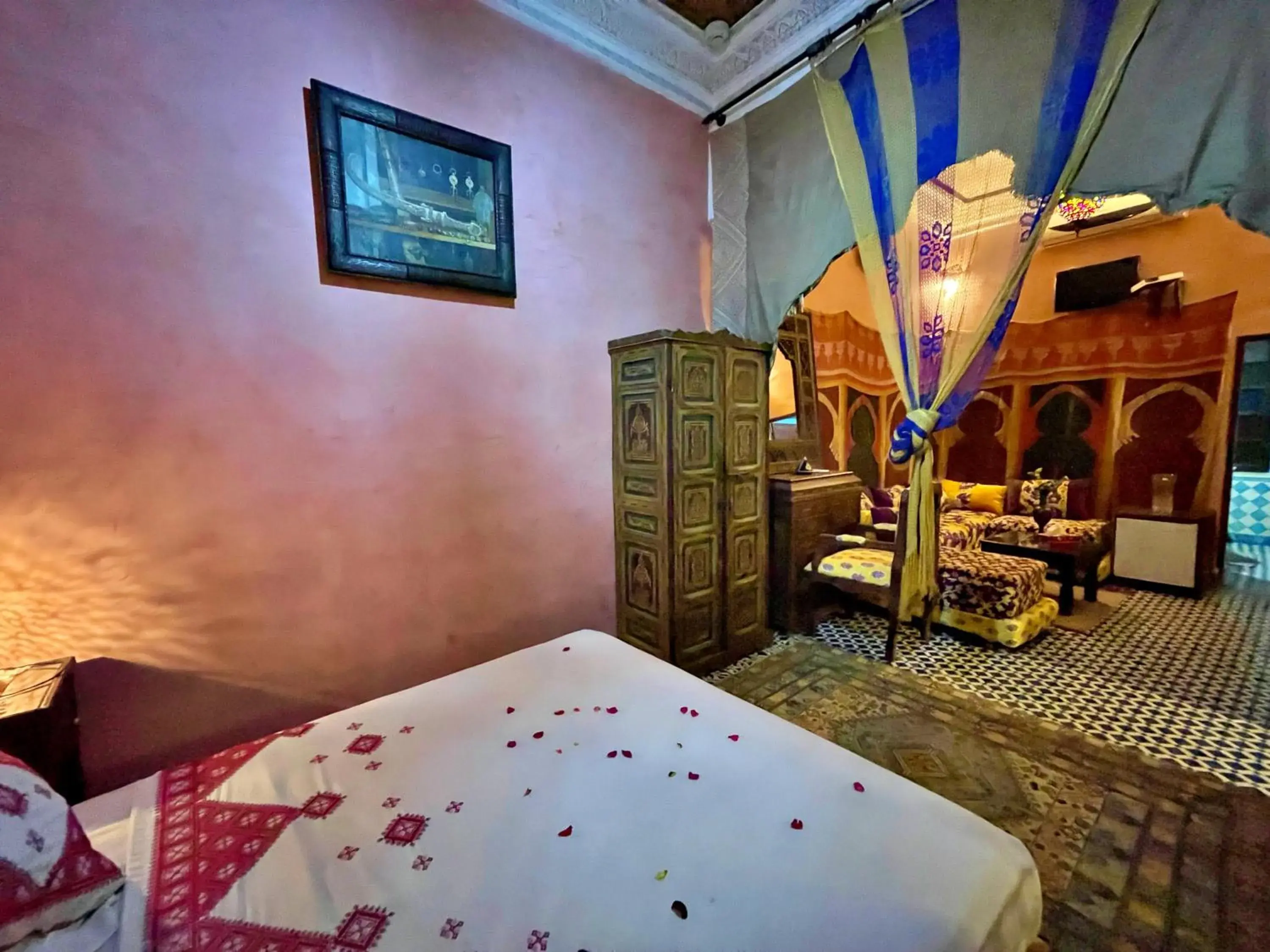 Seating area, Bed in Riad Dar Guennoun - Luxury Suites in the Heart of Fes Seating area, Bed in Riad Dar Guennoun - Luxury Suites in the Heart of Fes