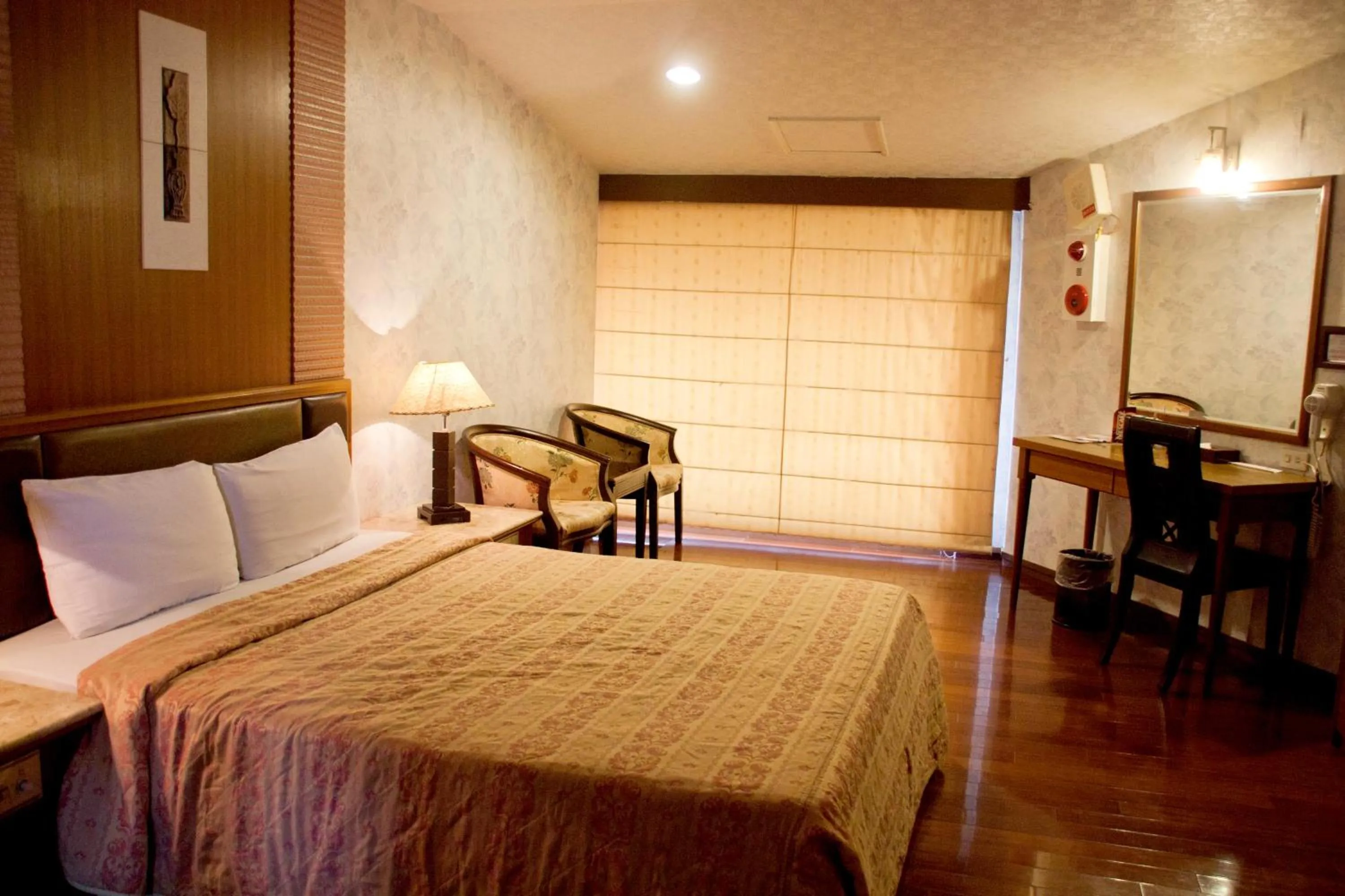 Bed in Paiwei Motel