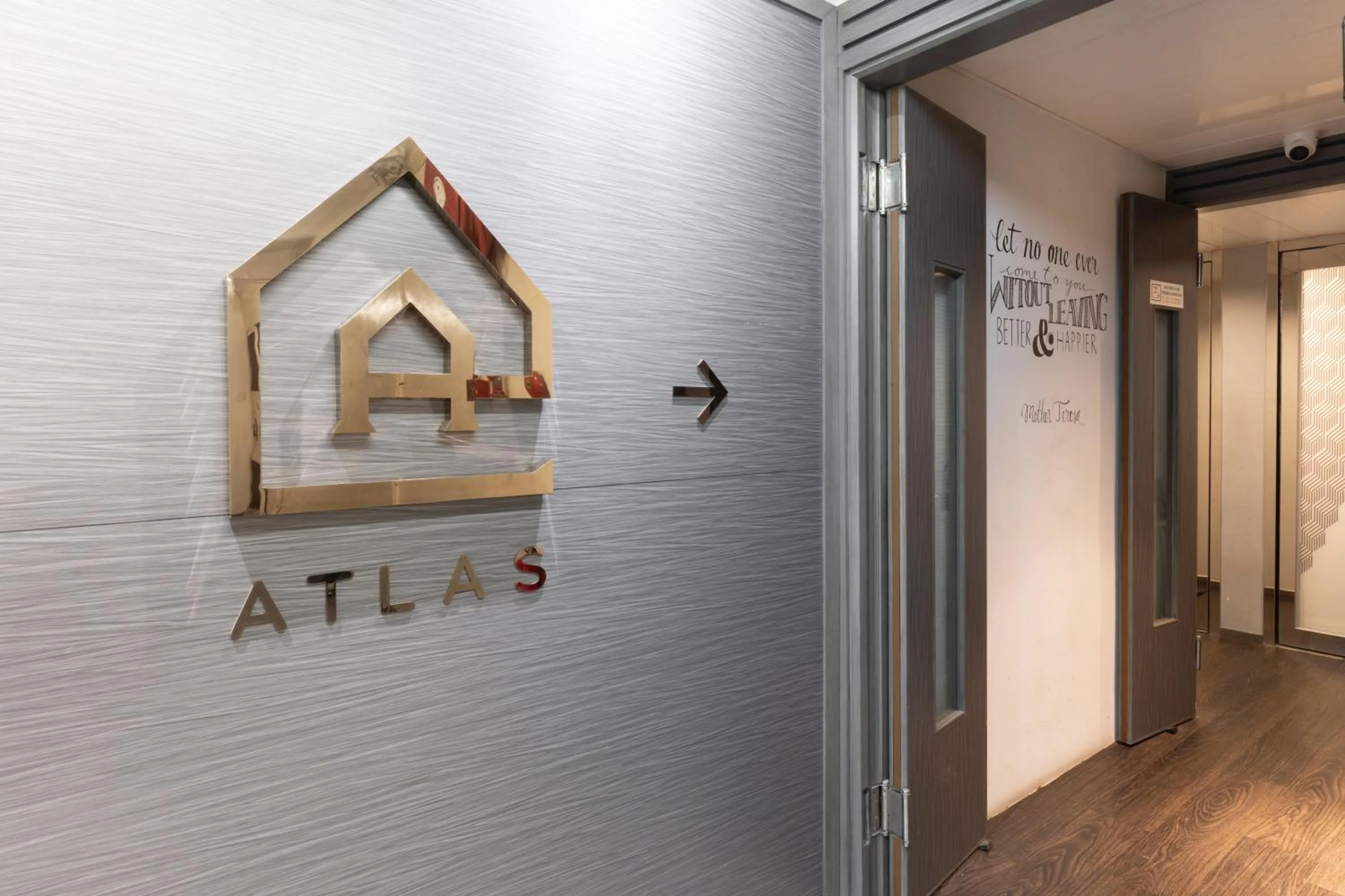 Property logo or sign in Atlas Hostel & Backpackers