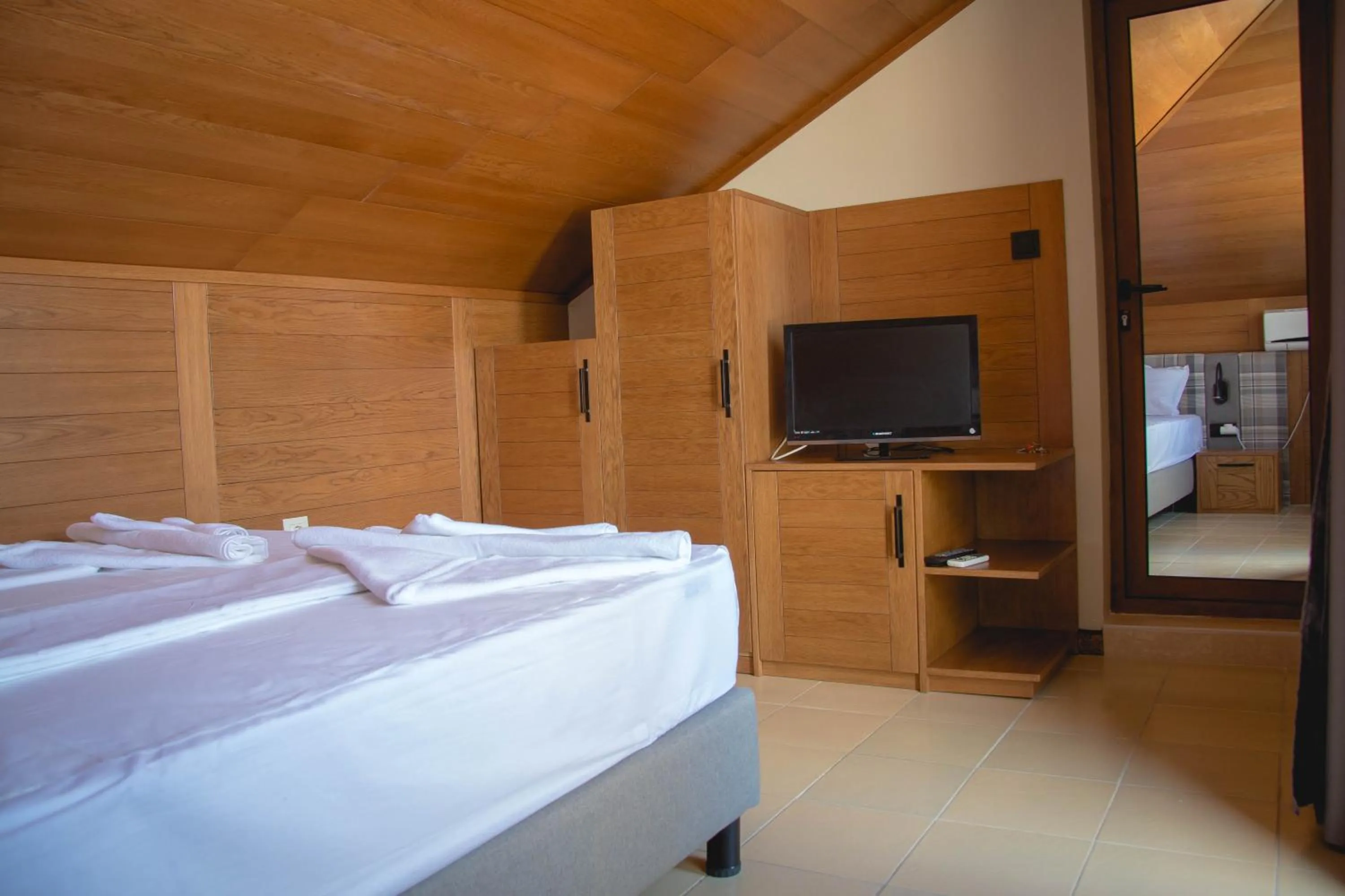 Bed in Prince Cyril Hotel