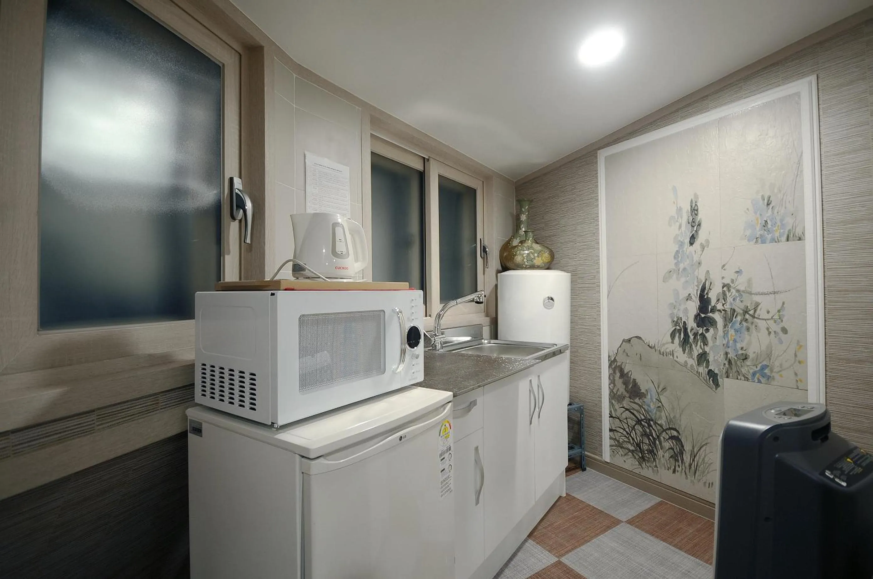 Kitchen or kitchenette in Family Hotel BNB