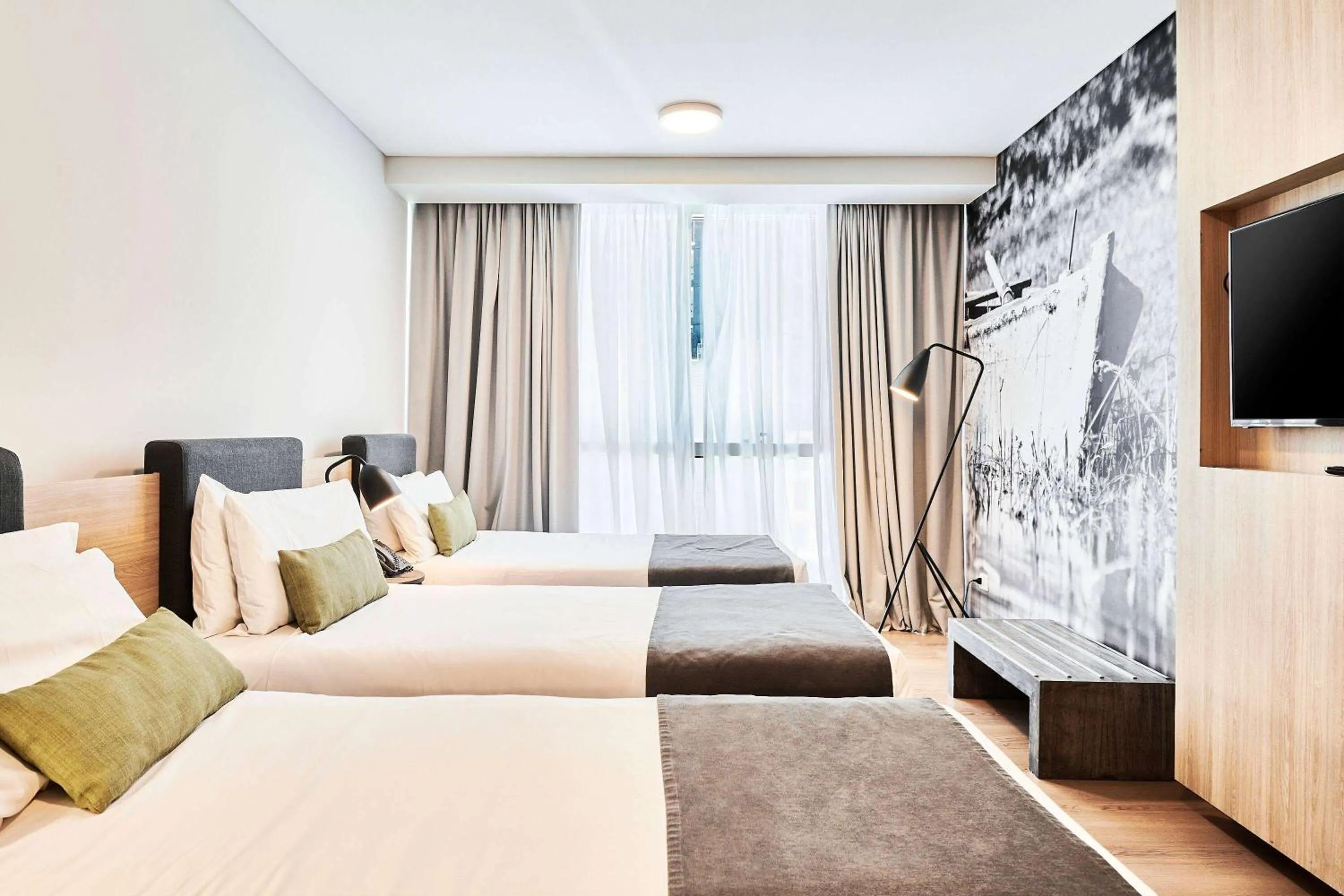 Photo of the whole room, Bed in Dazzler by Wyndham Rosario