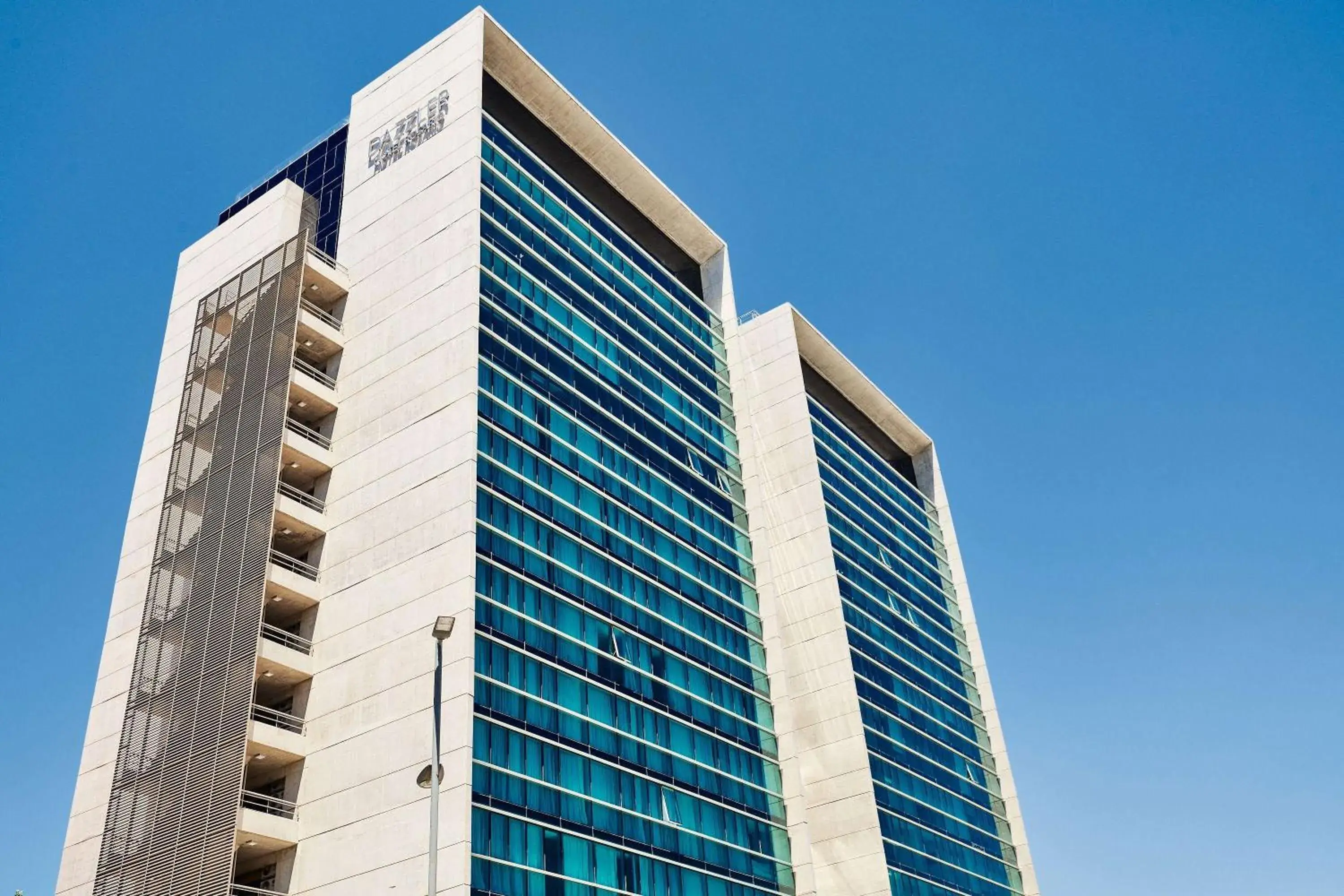 Property building in Dazzler by Wyndham Rosario Property building in Dazzler by Wyndham Rosario