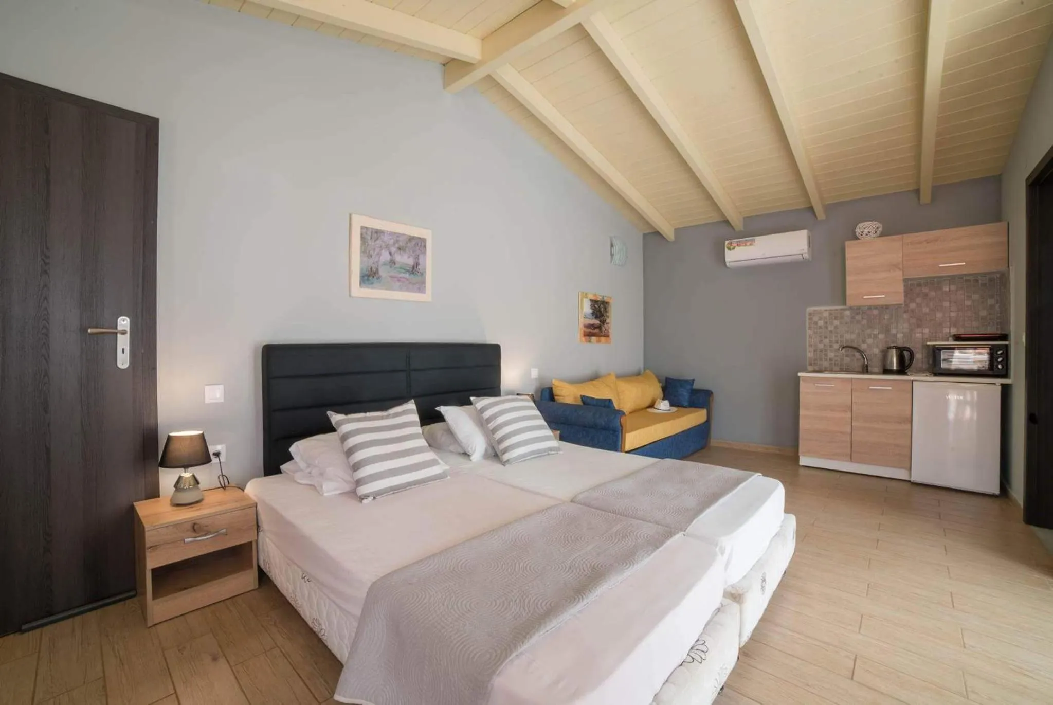 Bed in Tsolakis Studios & Apartments